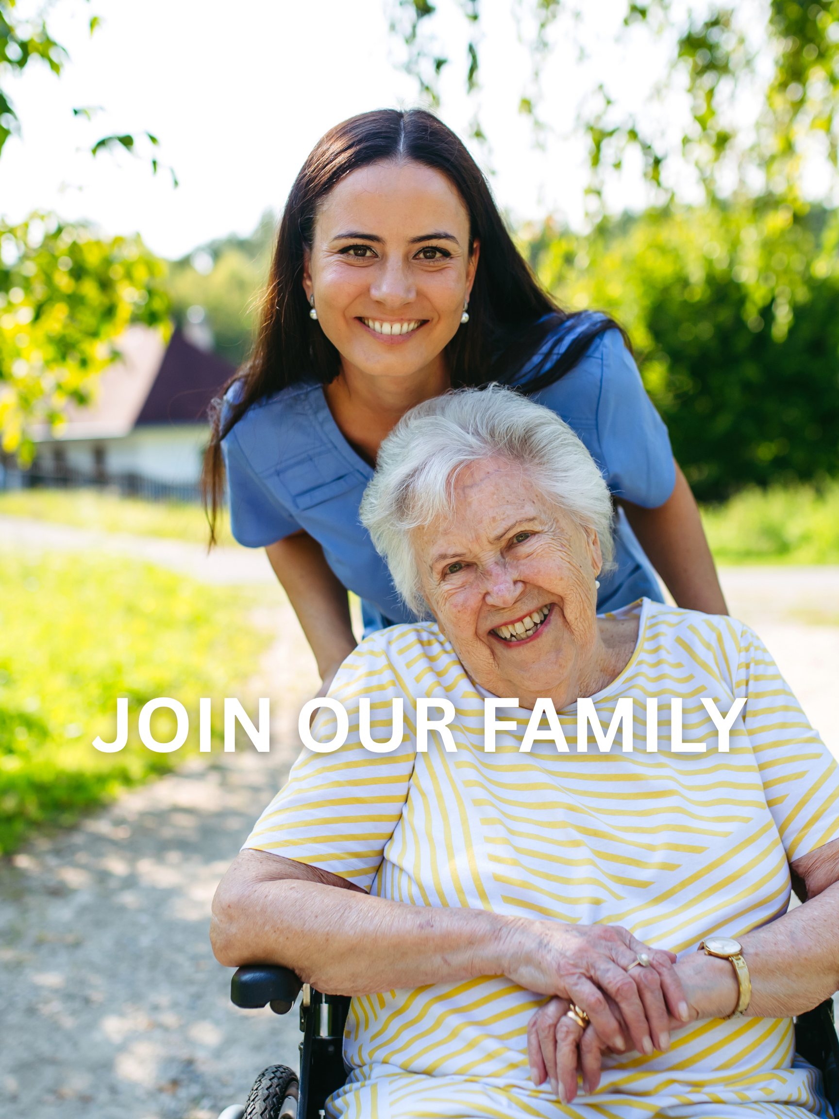 Join our family at Angel Oaks Personalized Assisted Living today where every patient is treated like family. Woman in a wheelchair with a caregiver smiling.