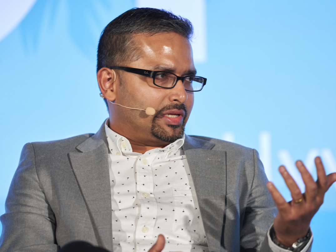 Kamanasish Kundu on a panel at Shoptalk 2024 discussing AI-powered personalization in retail, alongside panelists from Boston Consulting Group, DoorDash, and Circle K.