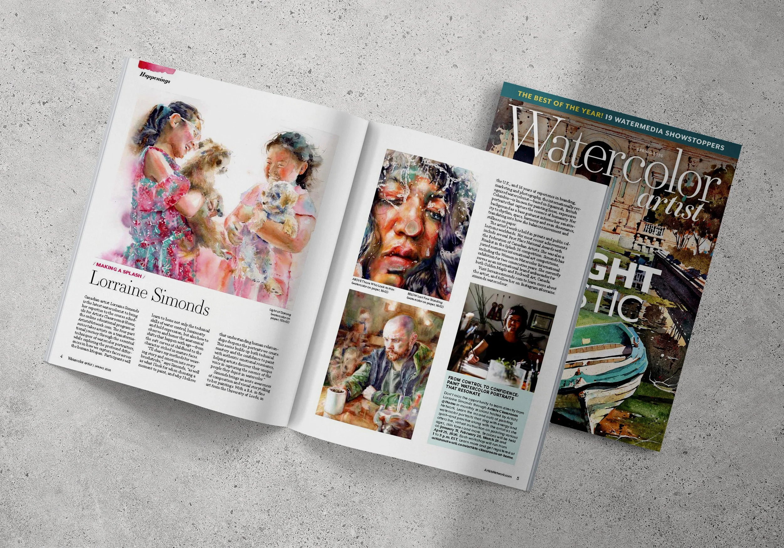 Open magazine on grey surface, featuring watercolor portraits of children and adults, with text and colorful images on the pages.