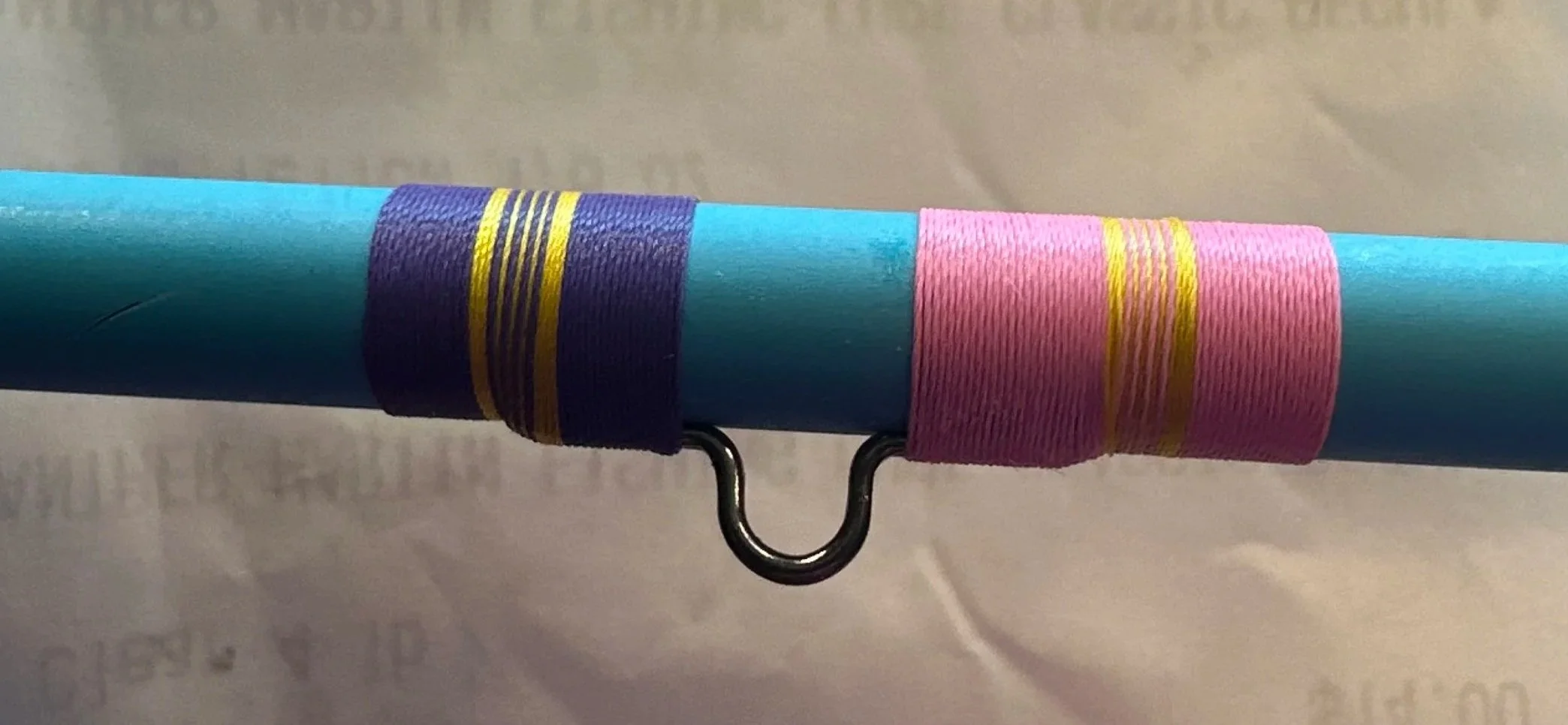 custom purple and yellow and pink and gold fishing rod thread wrap hook keeper