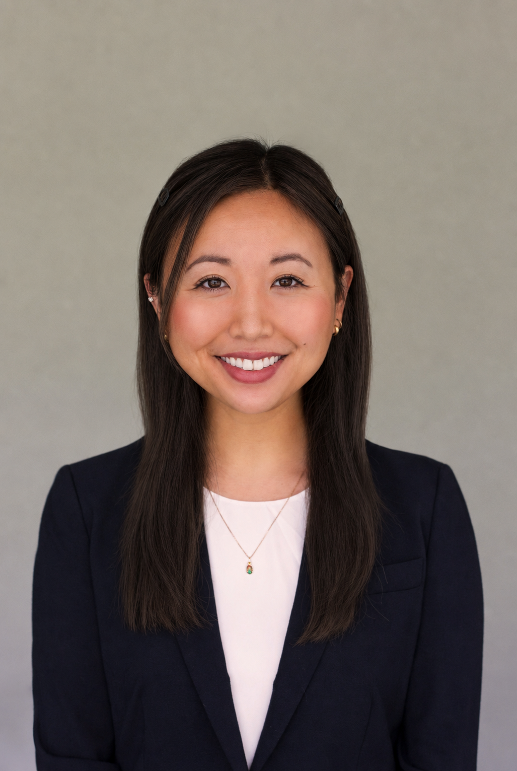 Professional headshot of Dr. Mimi Chen, a Mount Sinai-trained Asian psychiatrist and psychotherapist providing psychotherapy, couples therapy, and medication management in Manhattan and via telehealth throughout New York.