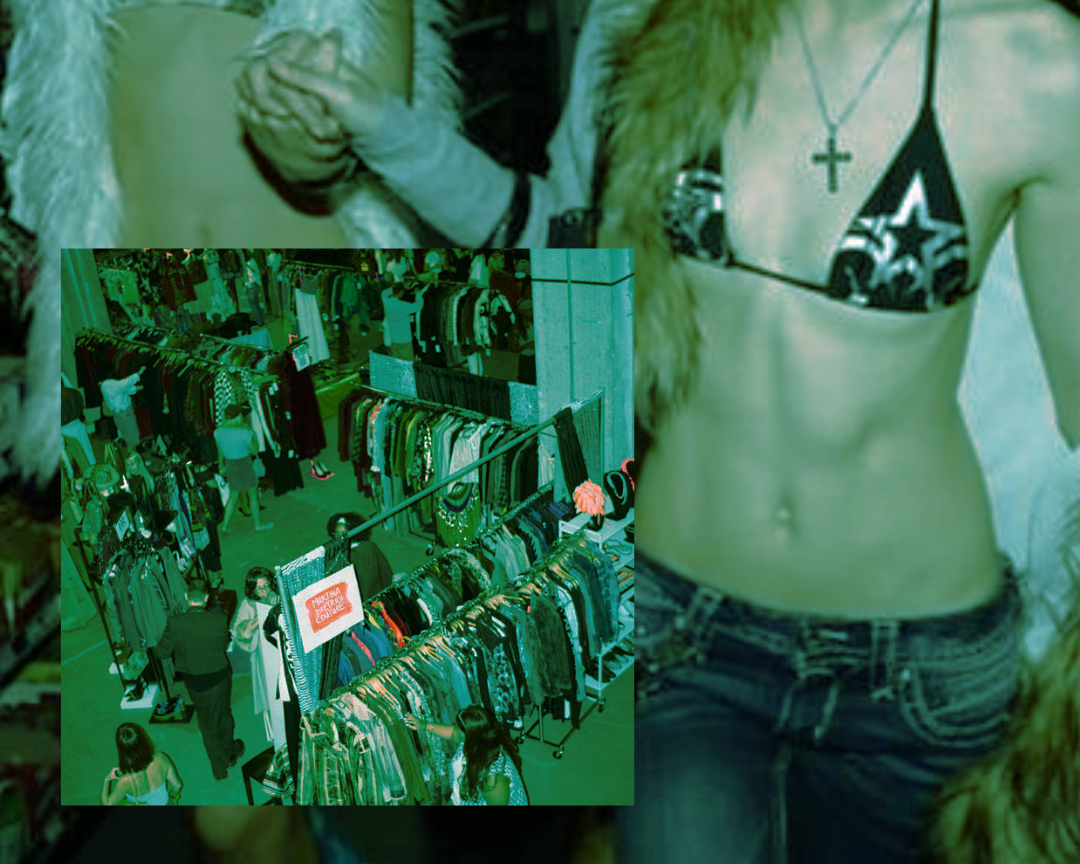 A shopping mall with clothing racks and customers shopping for apparel.