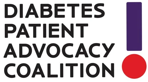  A group of diverse individuals holding signs advocating for diabetes awareness and support at a community event.
