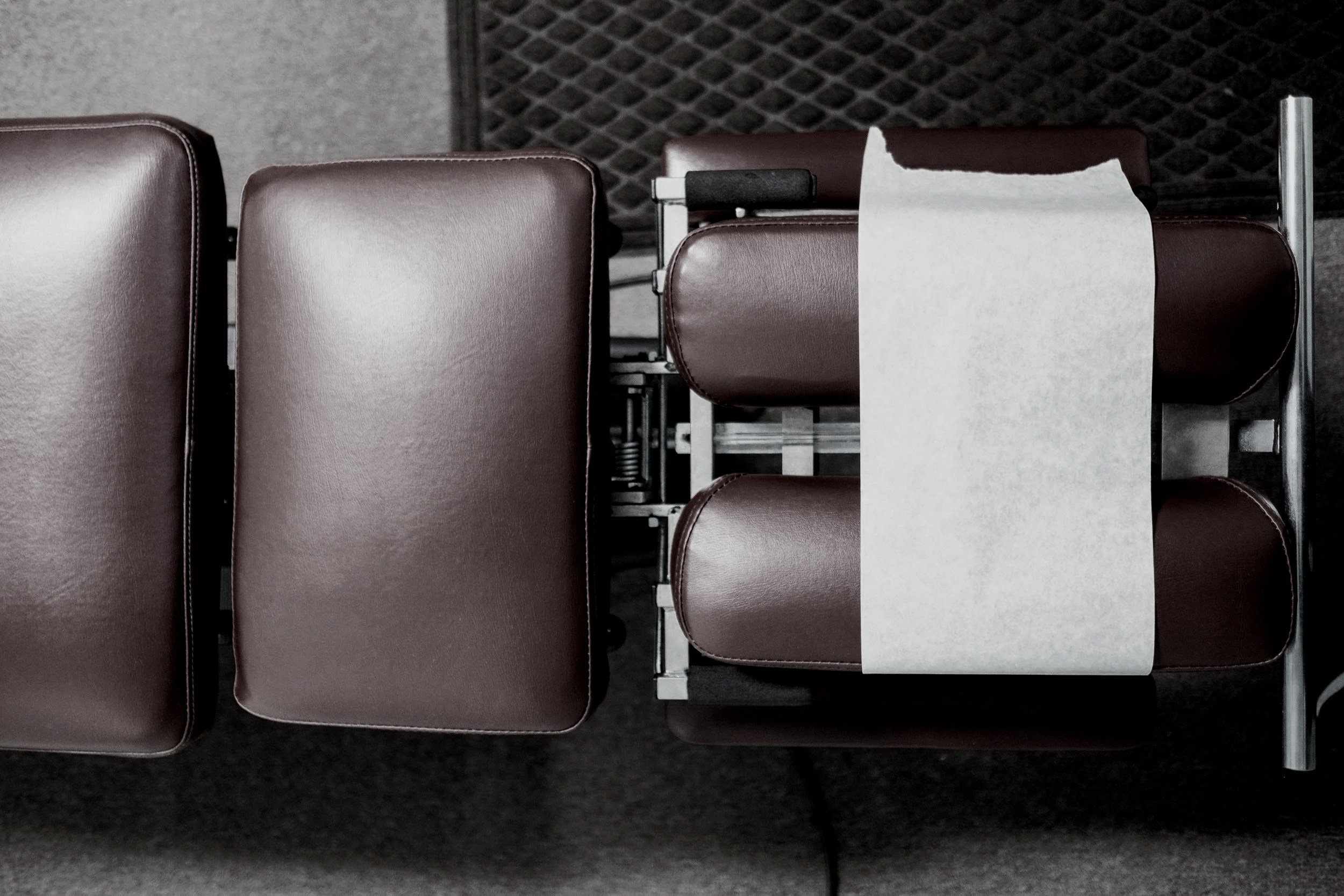Close-up view of a chiropractic treatment table