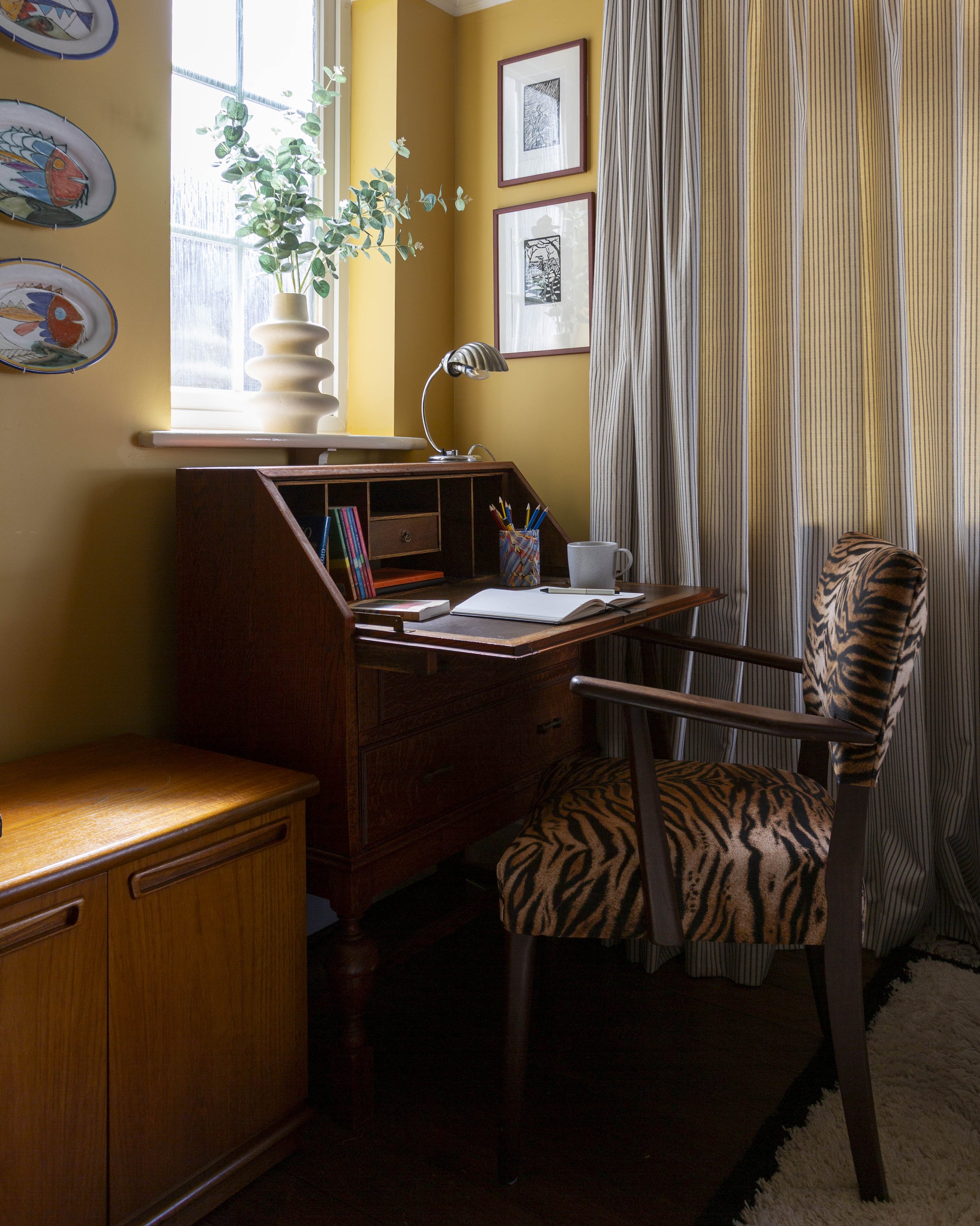 bureau with tiger print chair