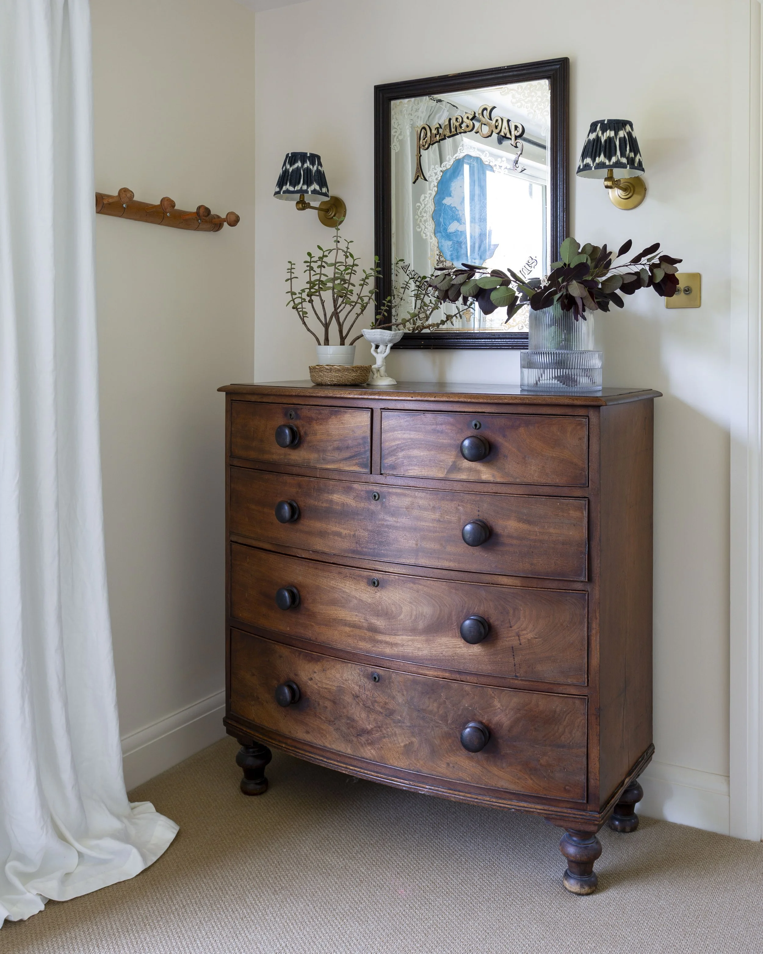 Wooden vintage chest of drawers with mirror and wall lights