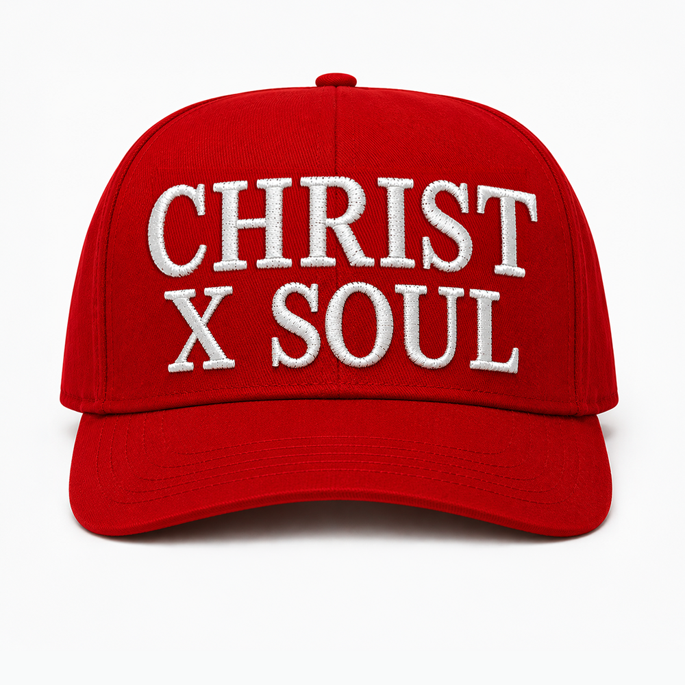 Red baseball cap with white embroidered text 'CHRIST X SOUL' on front