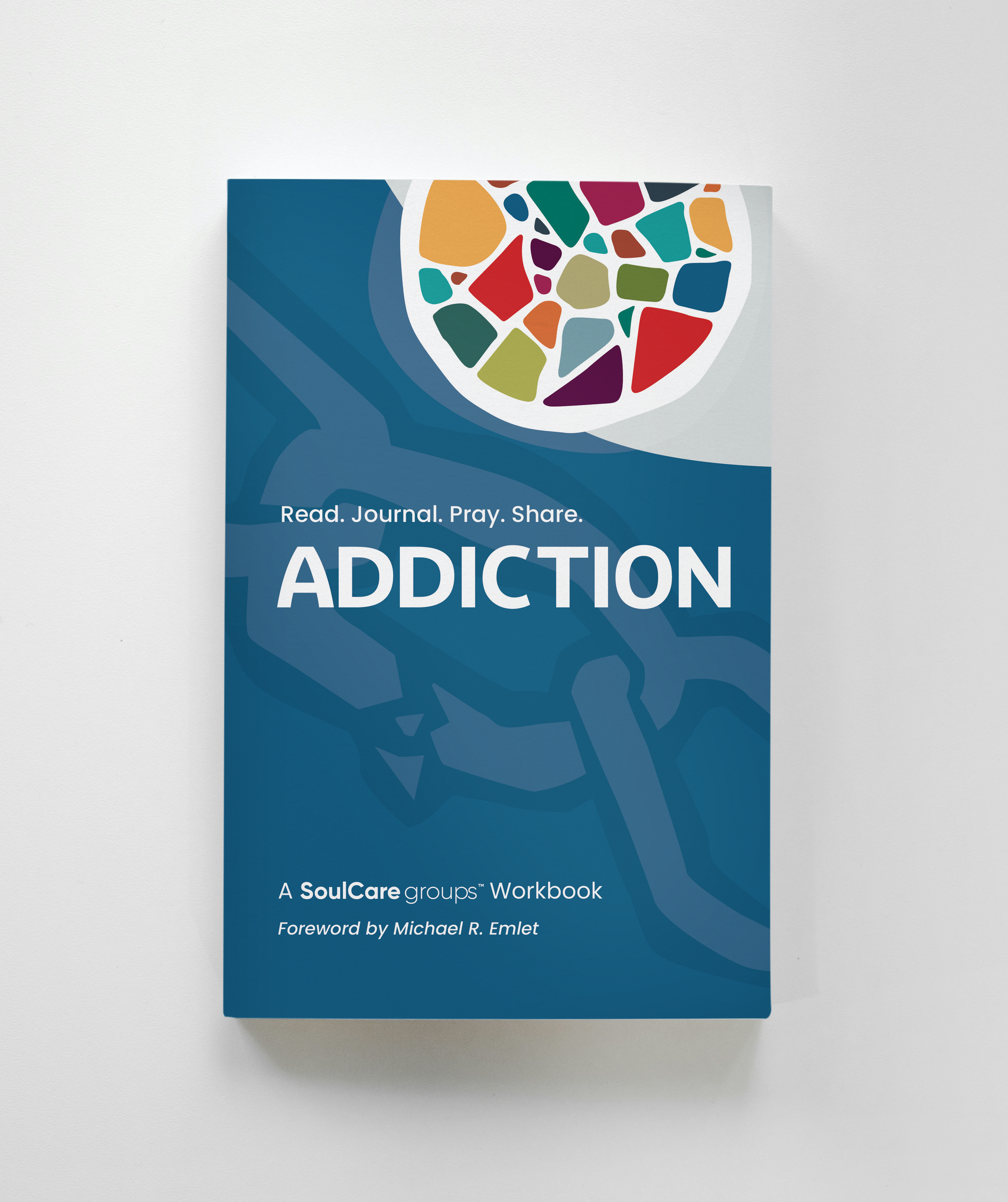 Blue workbook titled 'Addiction' with a colorful, mosaic-like circular pattern on the top right corner. Subtext reads 'Read. Journal. Pray. Share.' and 'A SoulCare groups Workbook'. Foreword by Michael R. Emlet.