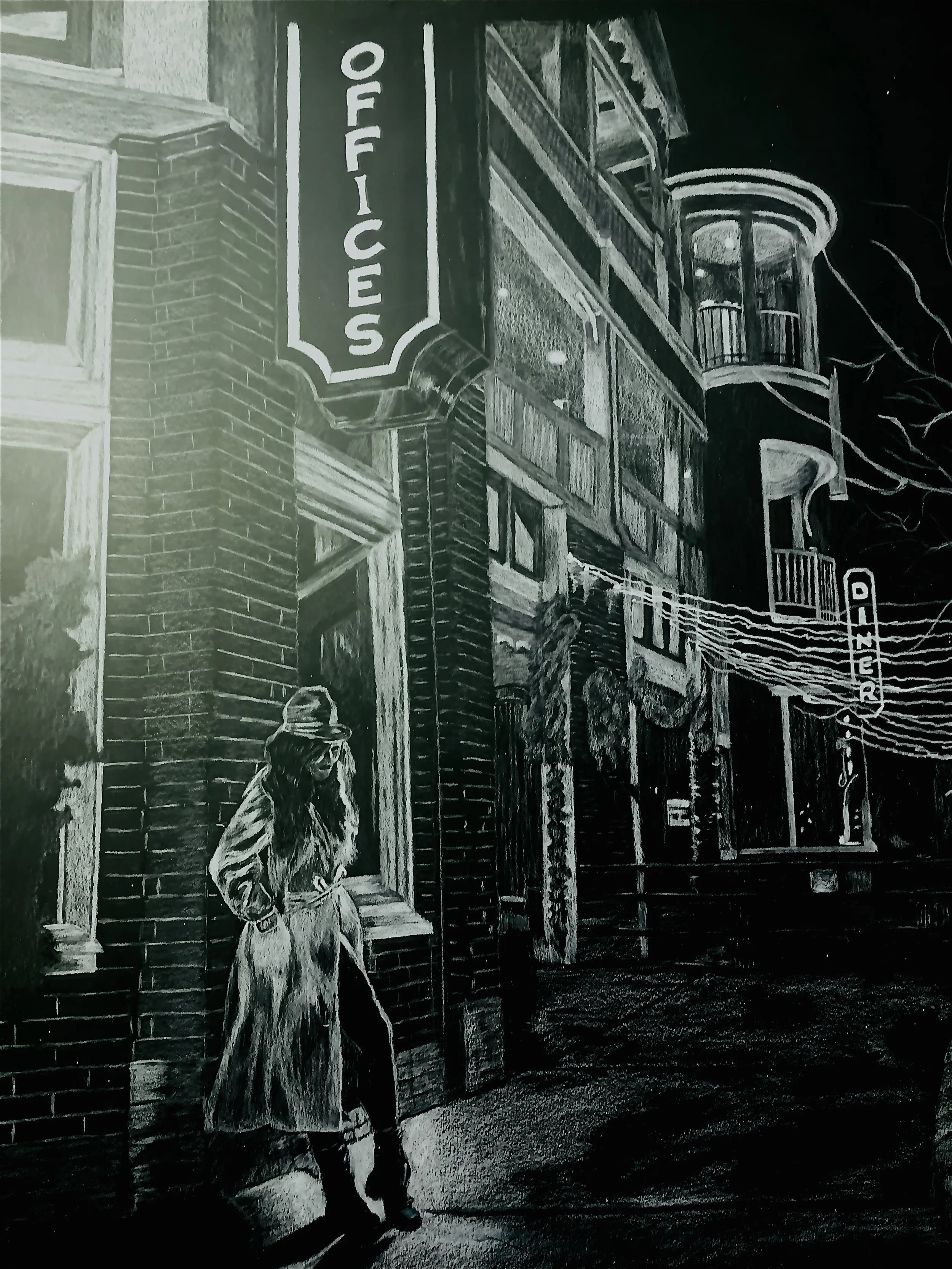 Black and white street scene showing a man with a hat and long coat walking past a building with a sign that reads 'OFFICES' and a detailed architecture including balconies and electrical wires at night.
