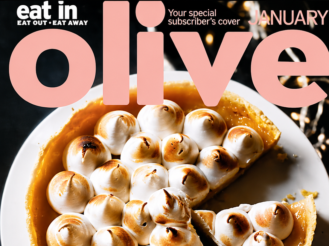 Magazine cover with the title 'Olive' in large pink letters, featuring a lemon meringue pie with toasted meringue peaks on a white plate, set against a dark background with blurred lights.