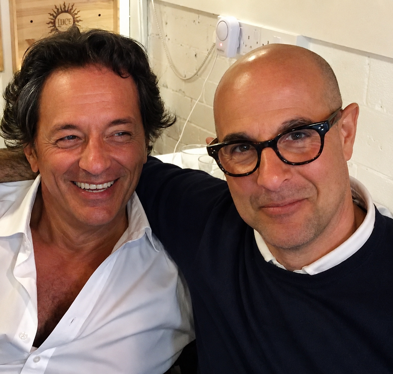 Stanley Tucci with Riccardo, owner of Al Boccon di Vino in Richmond upon Thames.