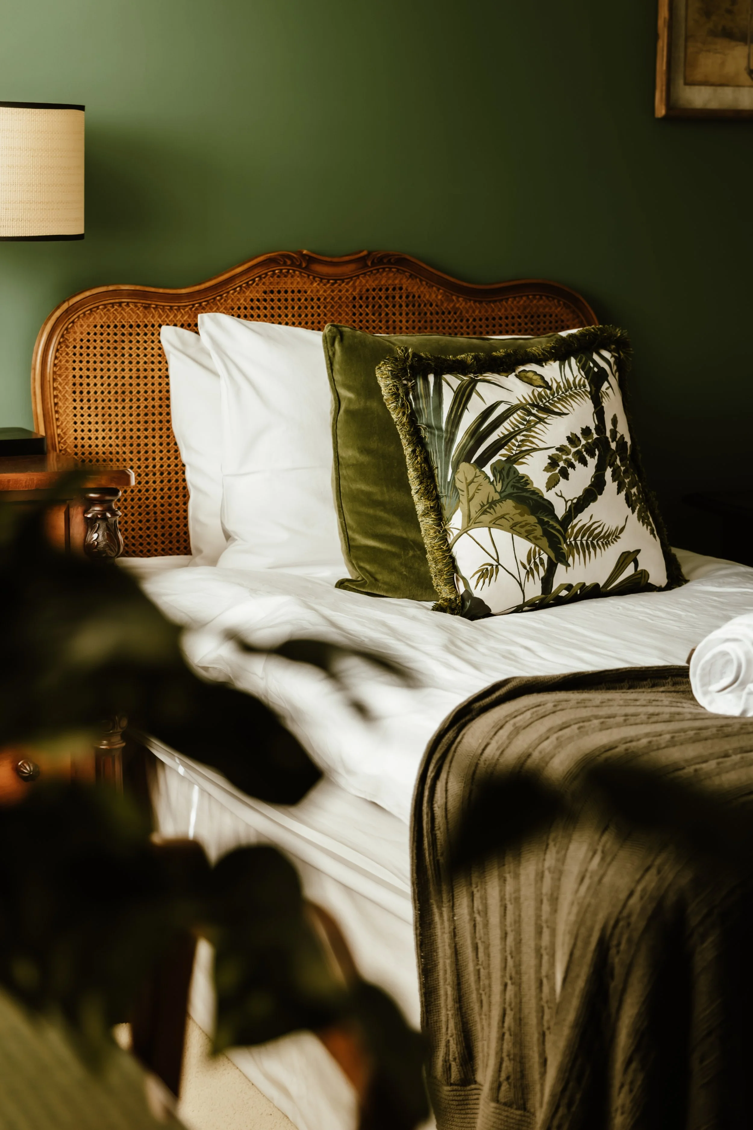 A cozy bedroom scene in a luxury North Norfolk wedding venue.
