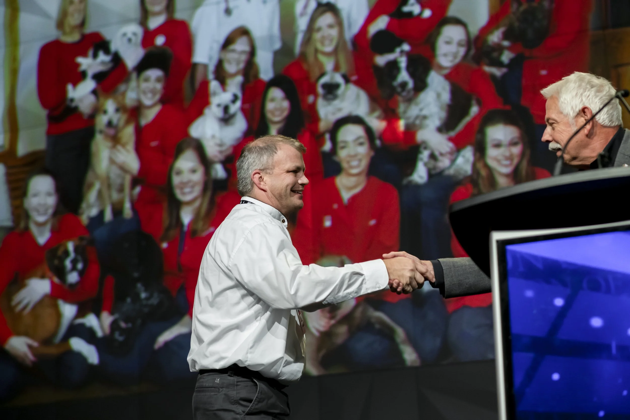 Mark Thompson, DVM, MBA, CCRP, receiving the American Animal Hospital Association Practice of the Year Award for Country Hills Pet Hospital in 2018.