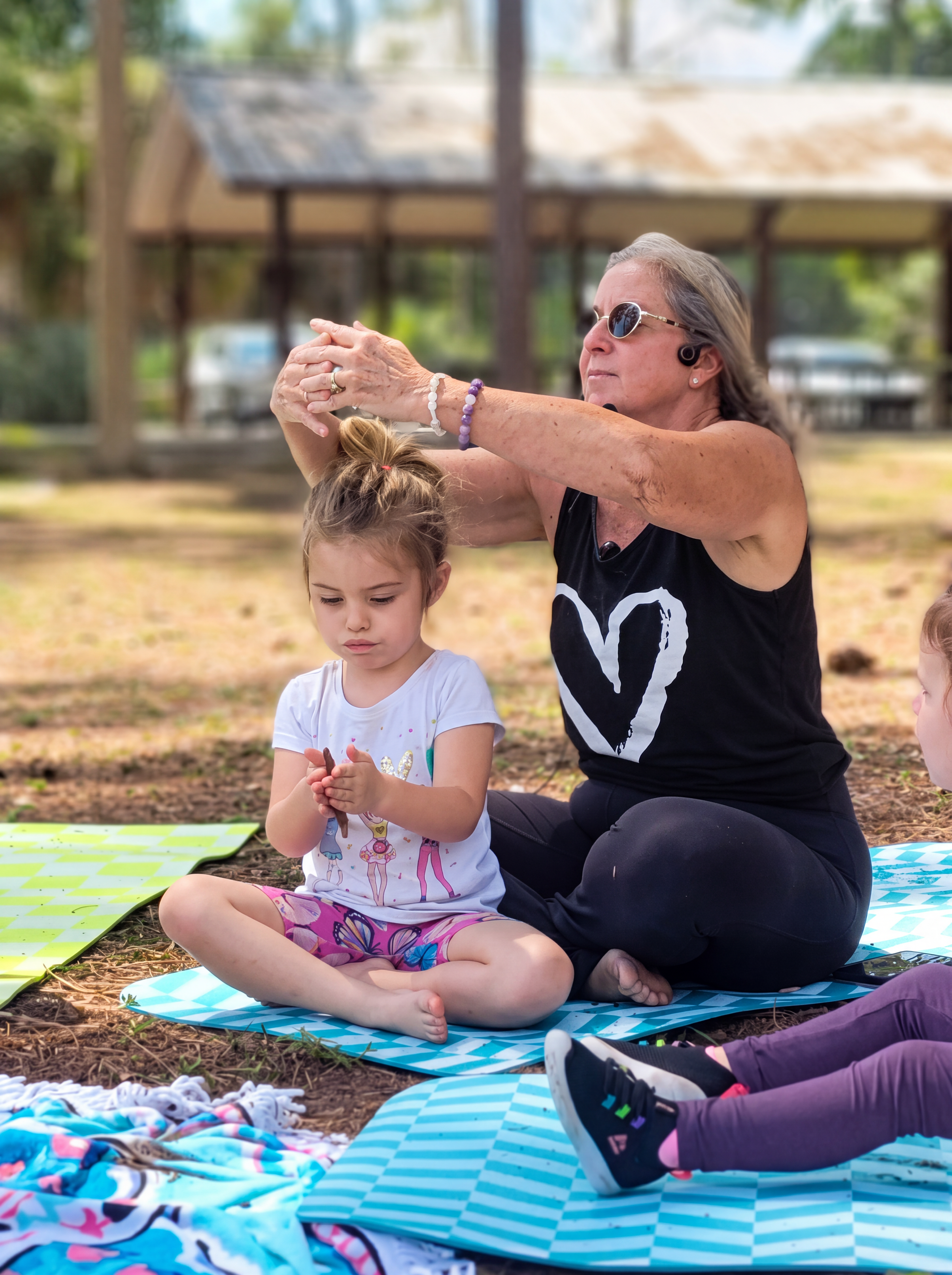 Motion Lab teacher and child doing yoga