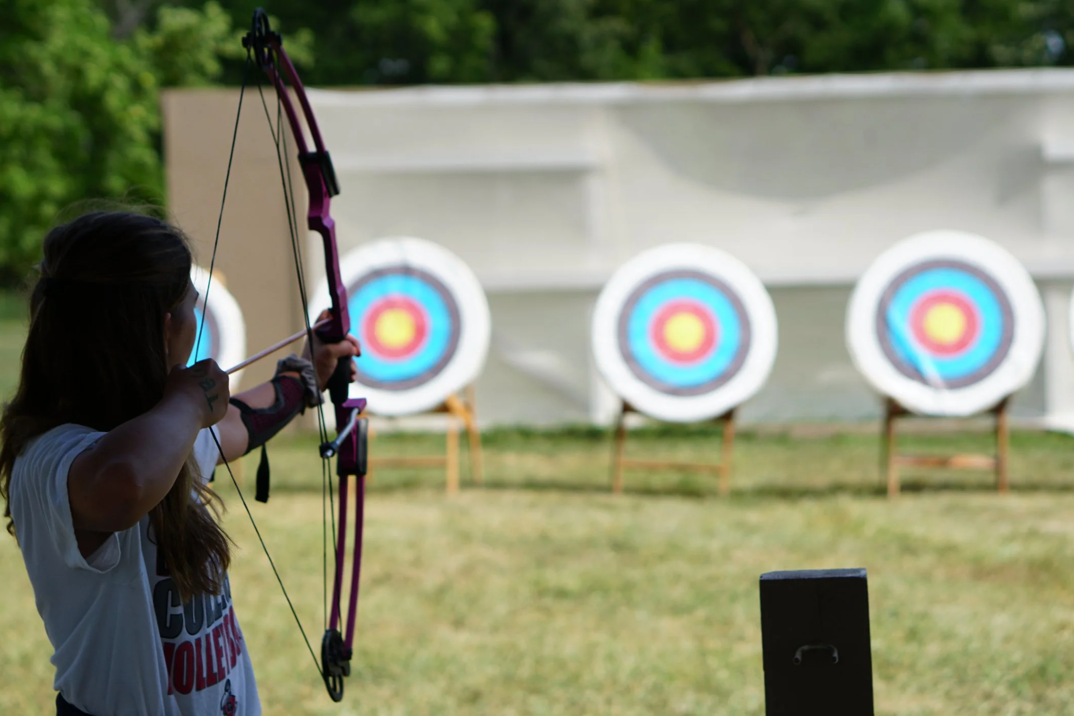 archery+girl+shooting+horizontal.png