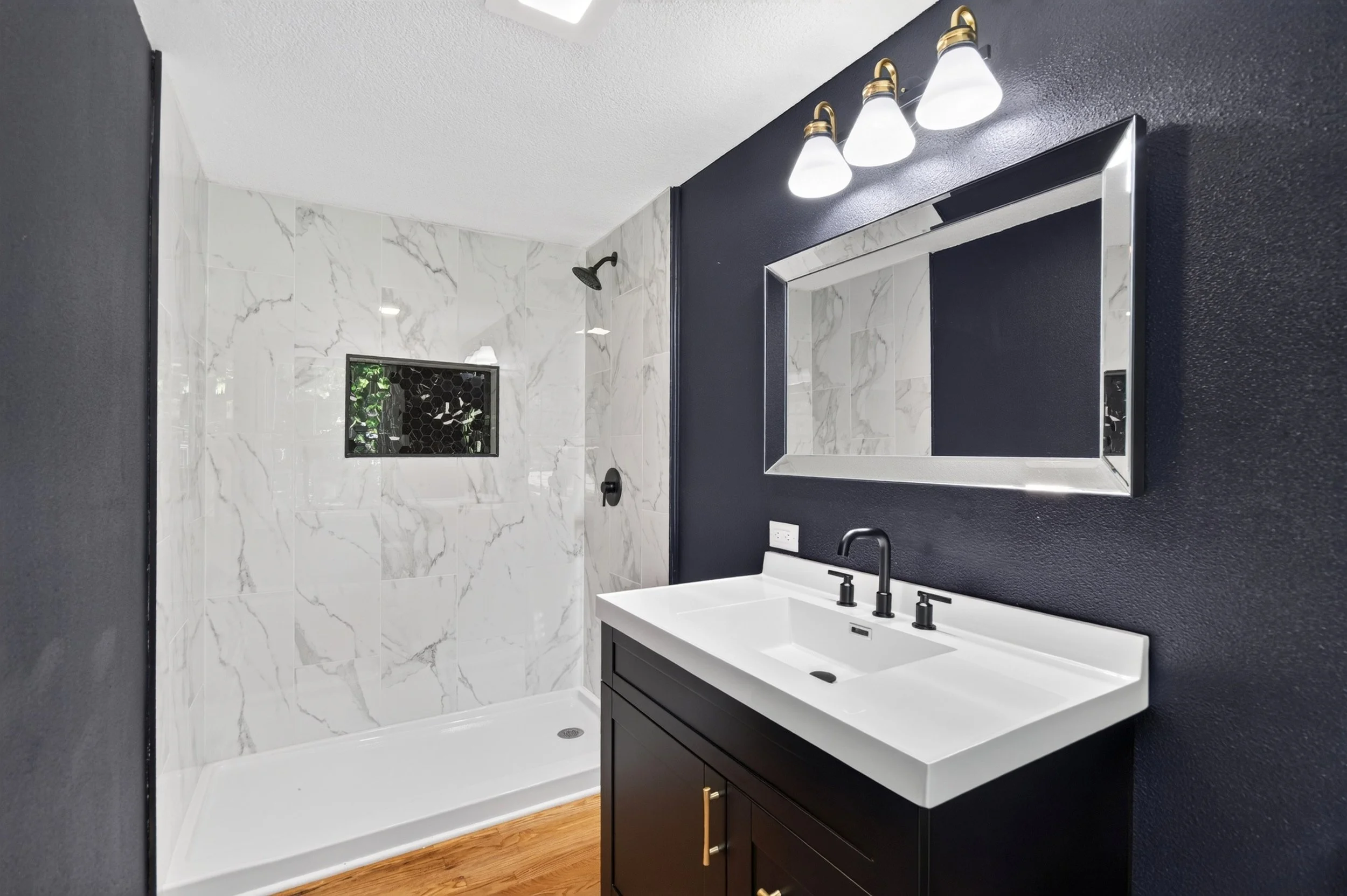 Bathroom professionally photographed for a real estate listing in Des Moines, Iowa.