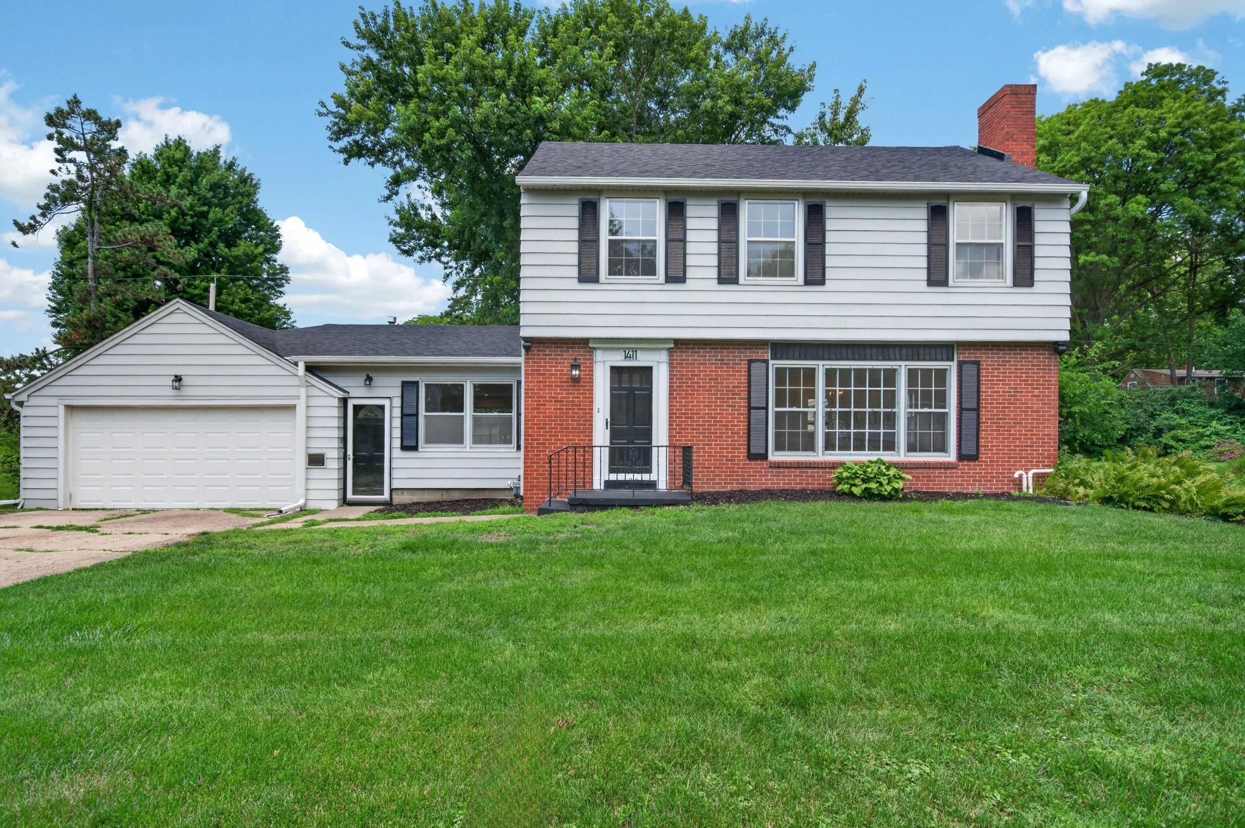 Front exterior professionally photographed for a real estate listing in Des Moines, Iowa.