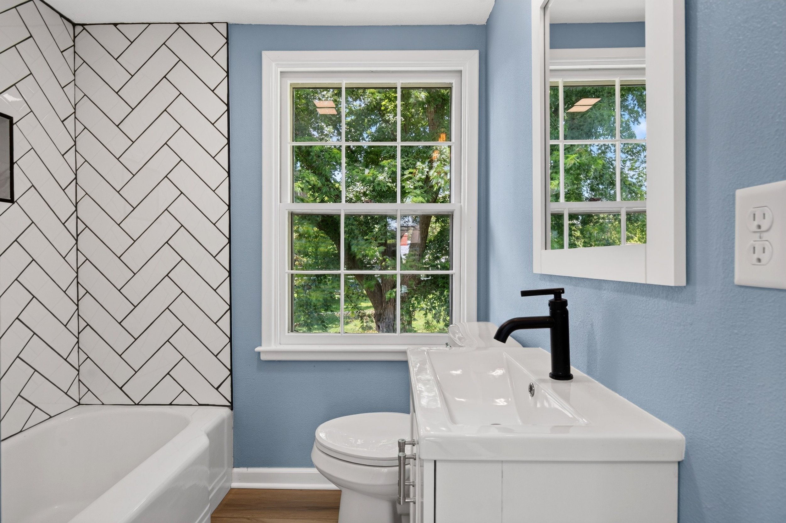 Bathroom professionally photographed for a real estate listing in Des Moines, Iowa.