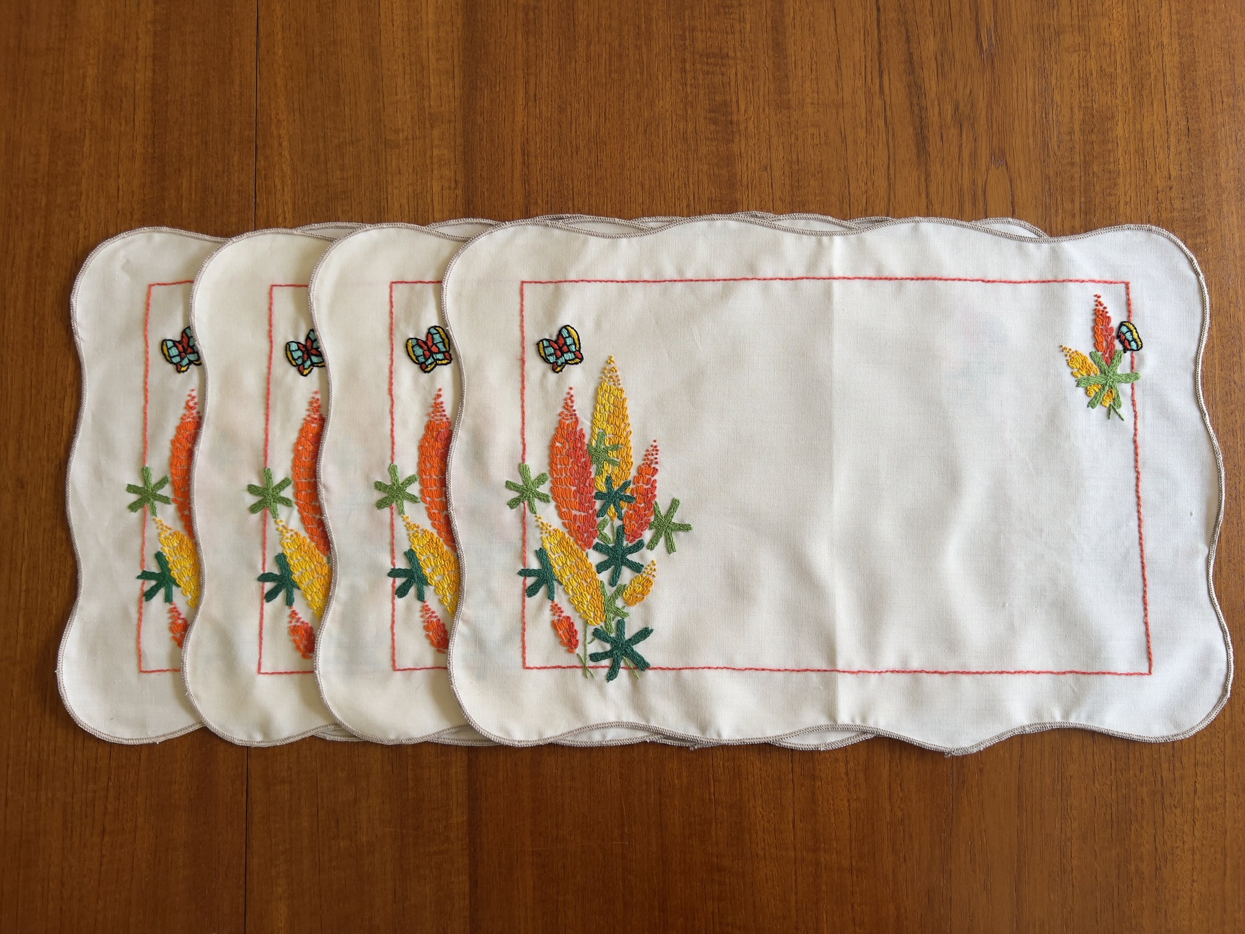 Embroidered flower & butterfly motif placemats - set of 4
