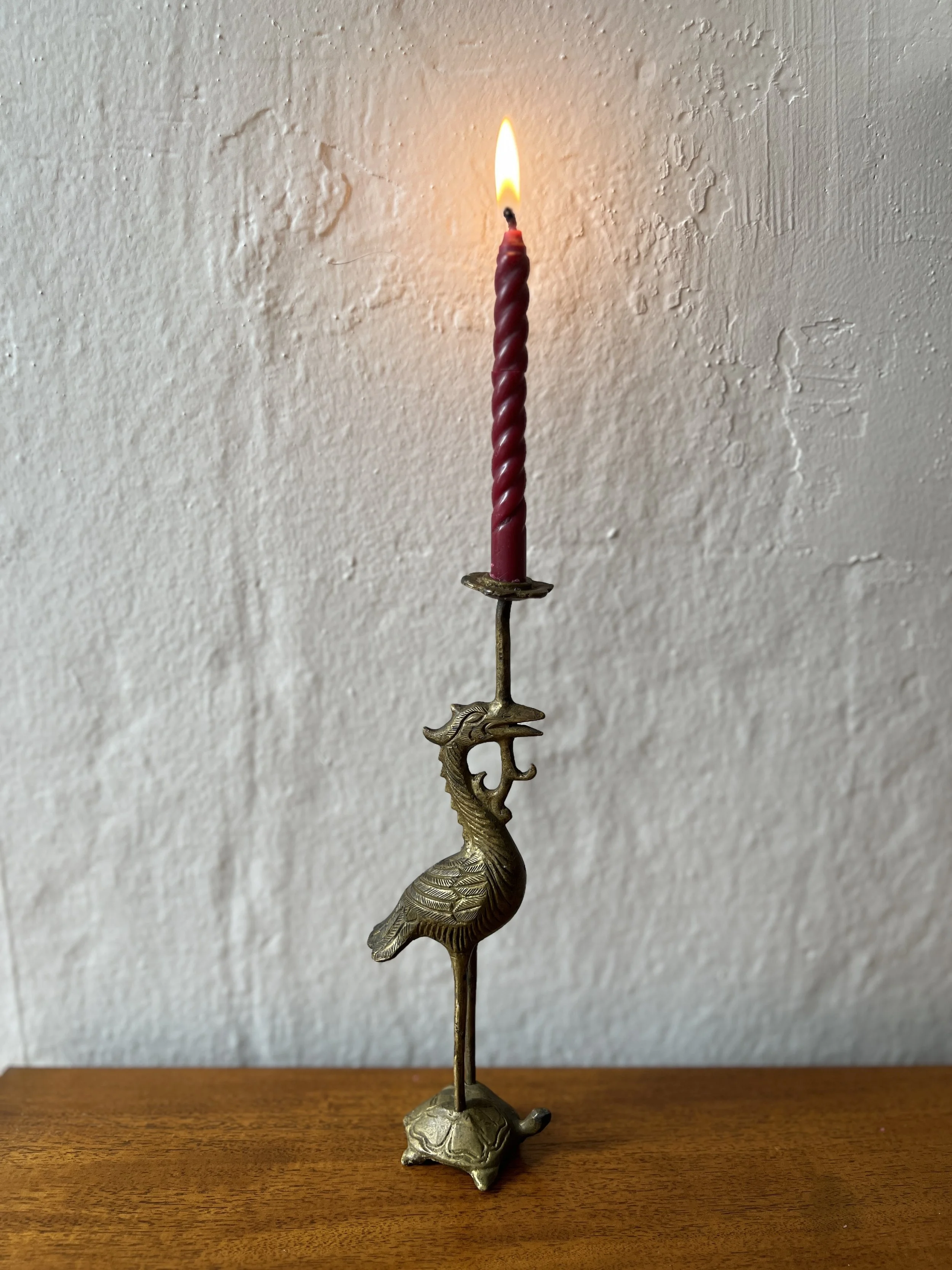 Antique solid brass crane candlestick