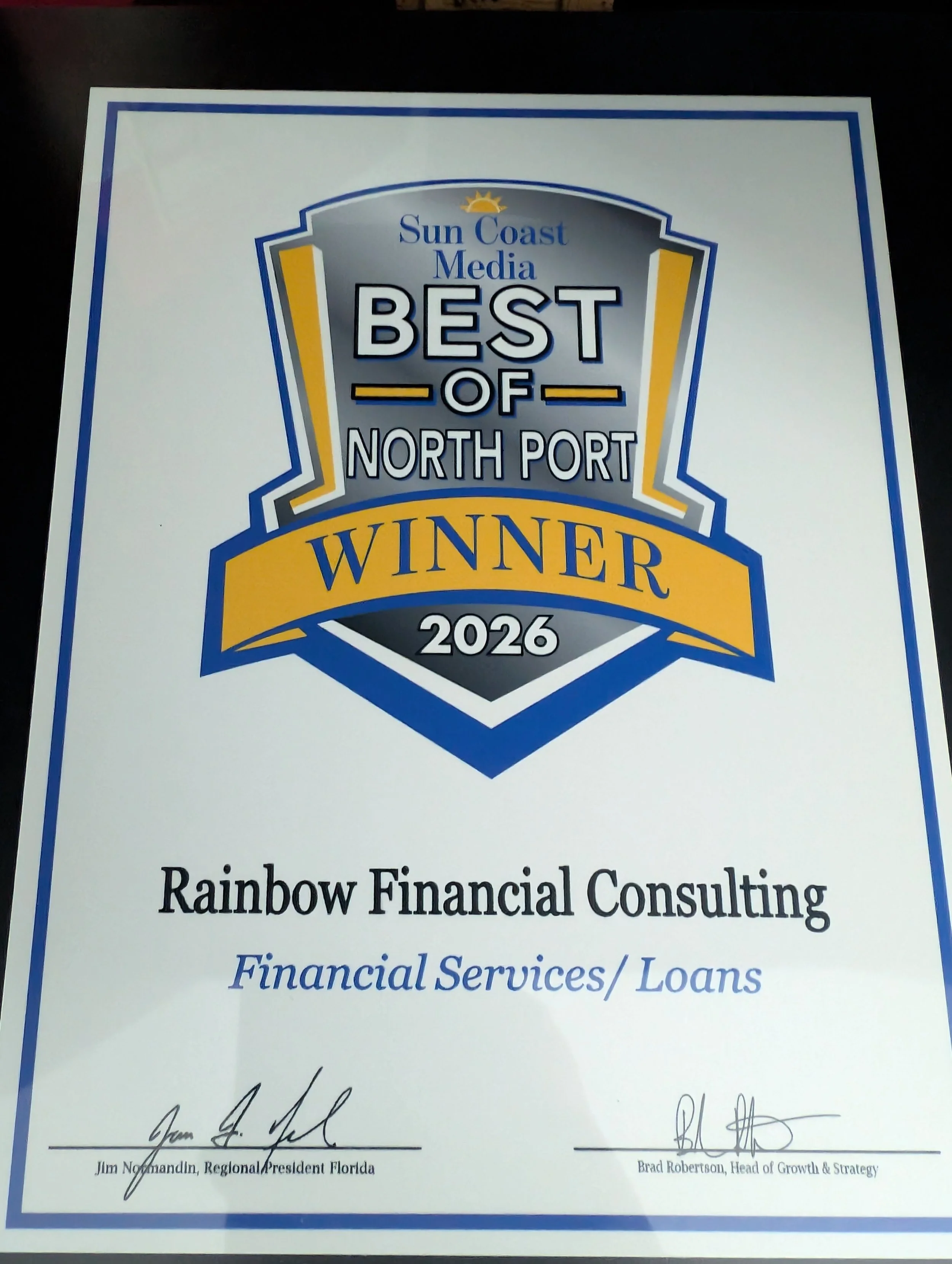 Certificate of recognition awarded to Rainbow Financial Consulting for being part of the 'Best of North Port' in 2026, presented by Sun Coast Media.