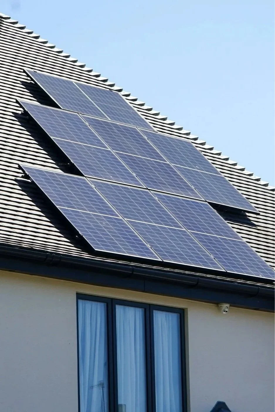 Solar panels installed on a residential house roof in Southern California - professional solar panel cleaning