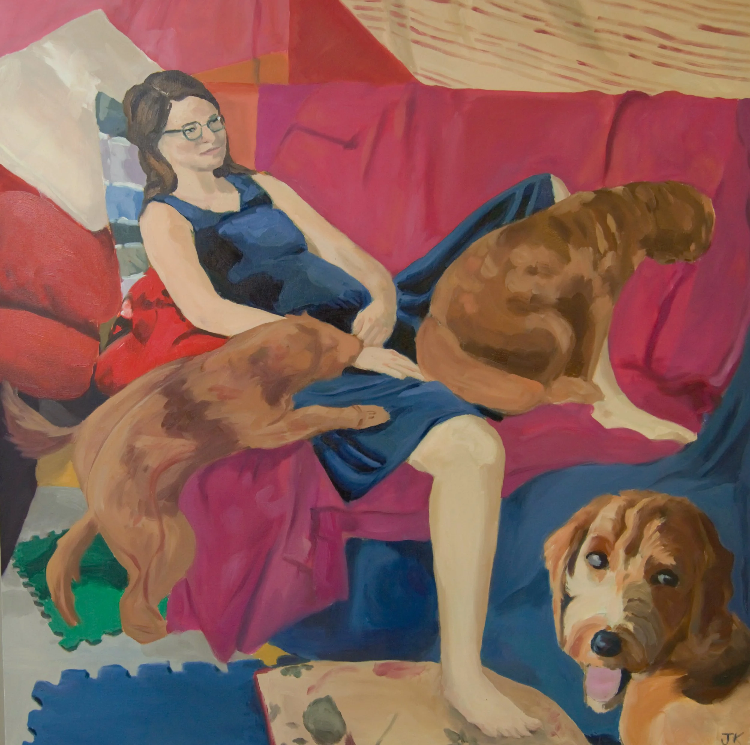 Painting of a woman with brown hair and glasses, wearing a blue top, lying on a red couch with colorful pillows. Part of a dog with brown fur and a white face is visible in the corner.