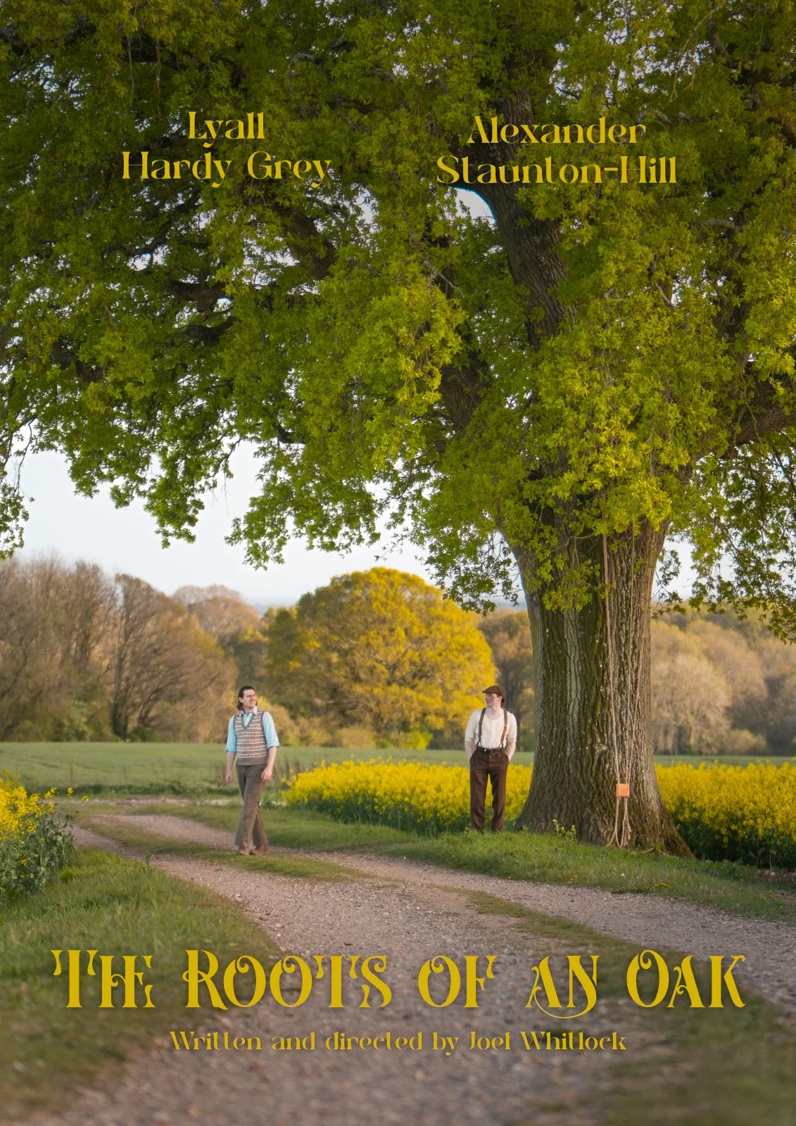 A cover or promotional image for a production called 'The Roots of an Oak,' showing two men standing on a dirt path under a large oak tree in a rural landscape with fields of yellow flowers and distant trees. Featuring Lyall Hardy Grey