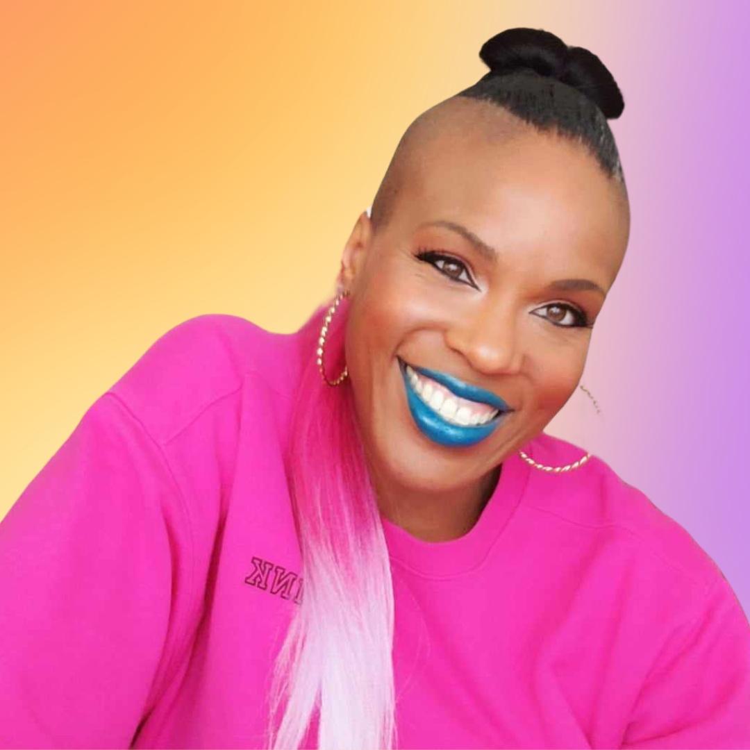 A smiling woman with blue lipstick, wearing a bright pink shirt and hoop earrings, against a gradient yellow and purple background.