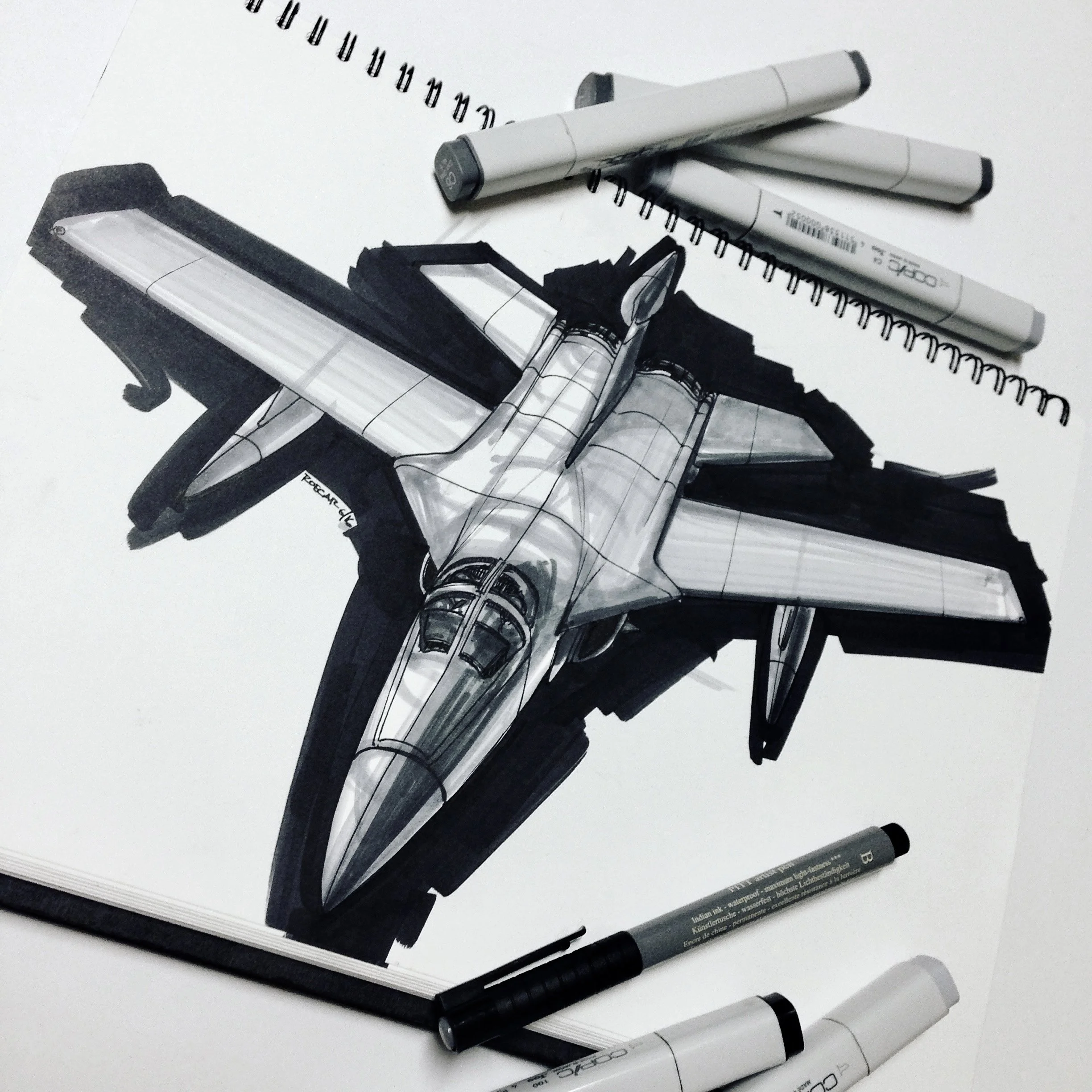 Plane sketch with markers on a sketch book.