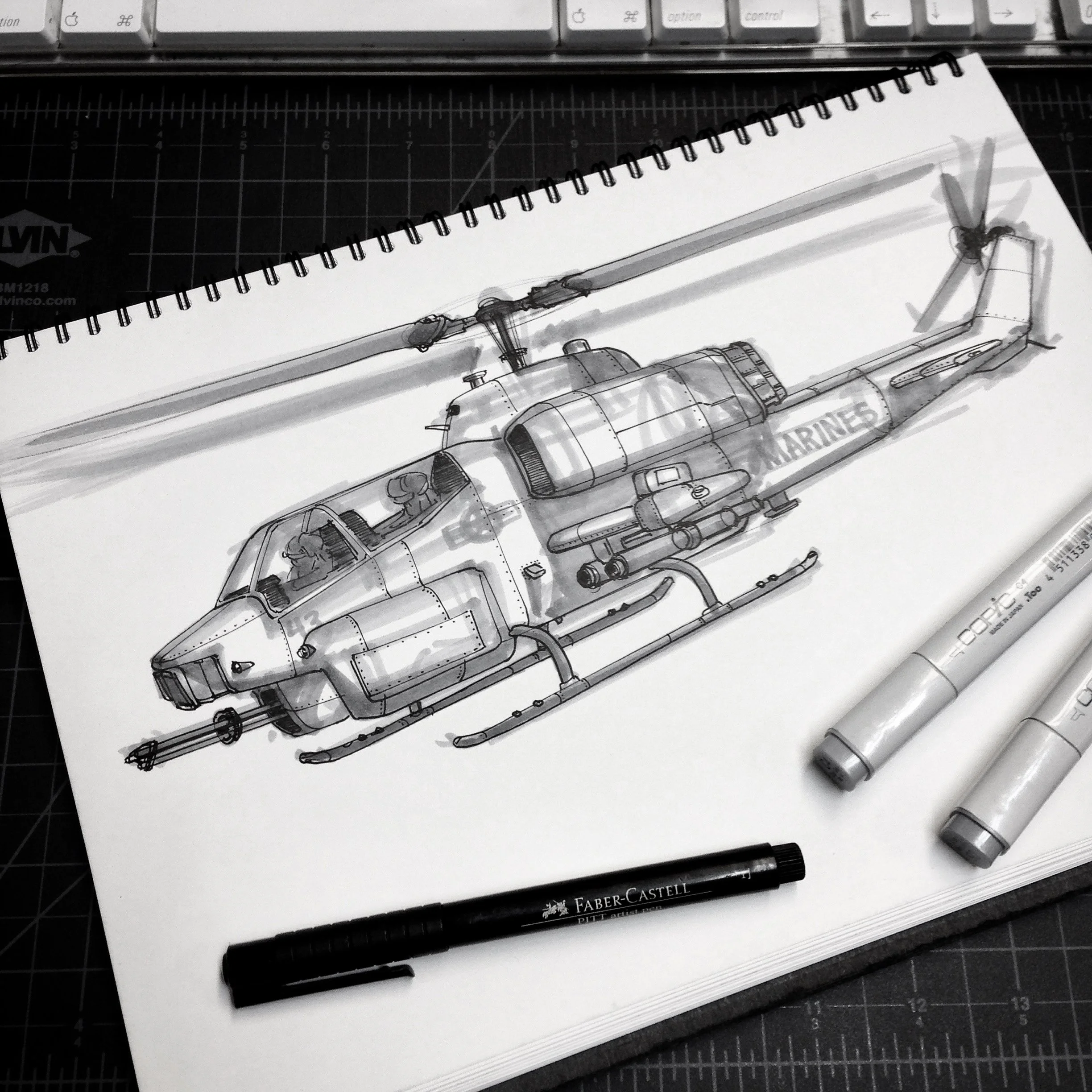 Cobra attack helicopter sketch with markers on a sketch book.