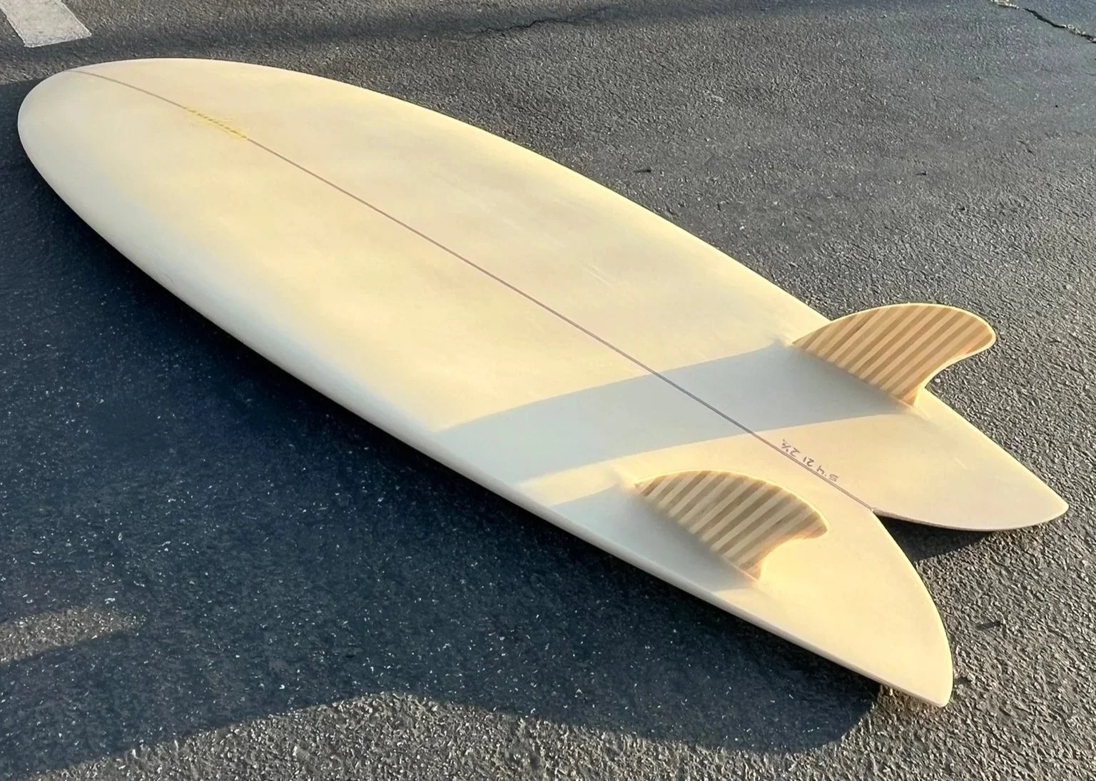 lula surfboards hand shaped 5'4 fish. Simmons bottom with bamboo 101 fins glassed on. polyola foam