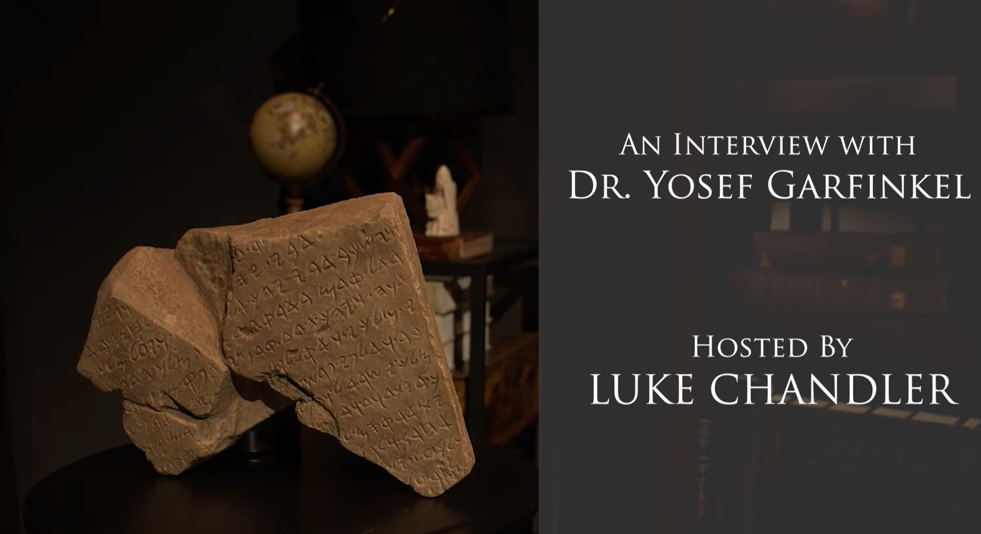 A torn ancient clay tablet with cuneiform inscriptions, part of a book cover titled 'An Interview with Dr. Yosef Garfinkel,' hosted by Luke Chandler.