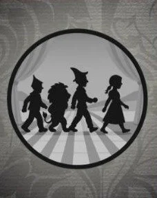 Silhouette of the Beatles in the Abbey Road album cover style