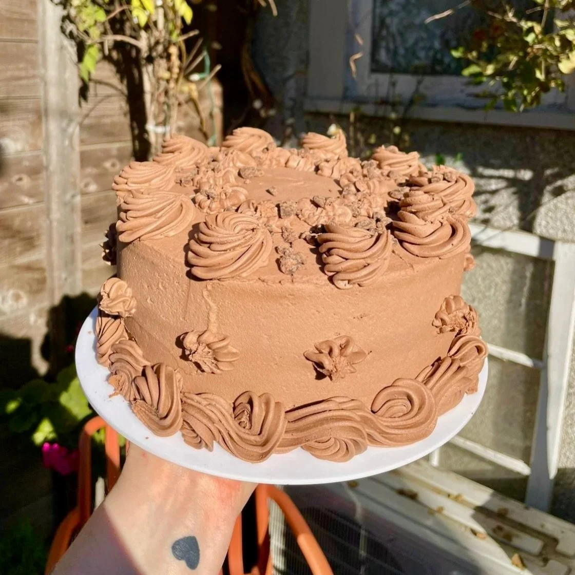 Chocolate cake by the slice ft. the cutest lil tattoo 💟