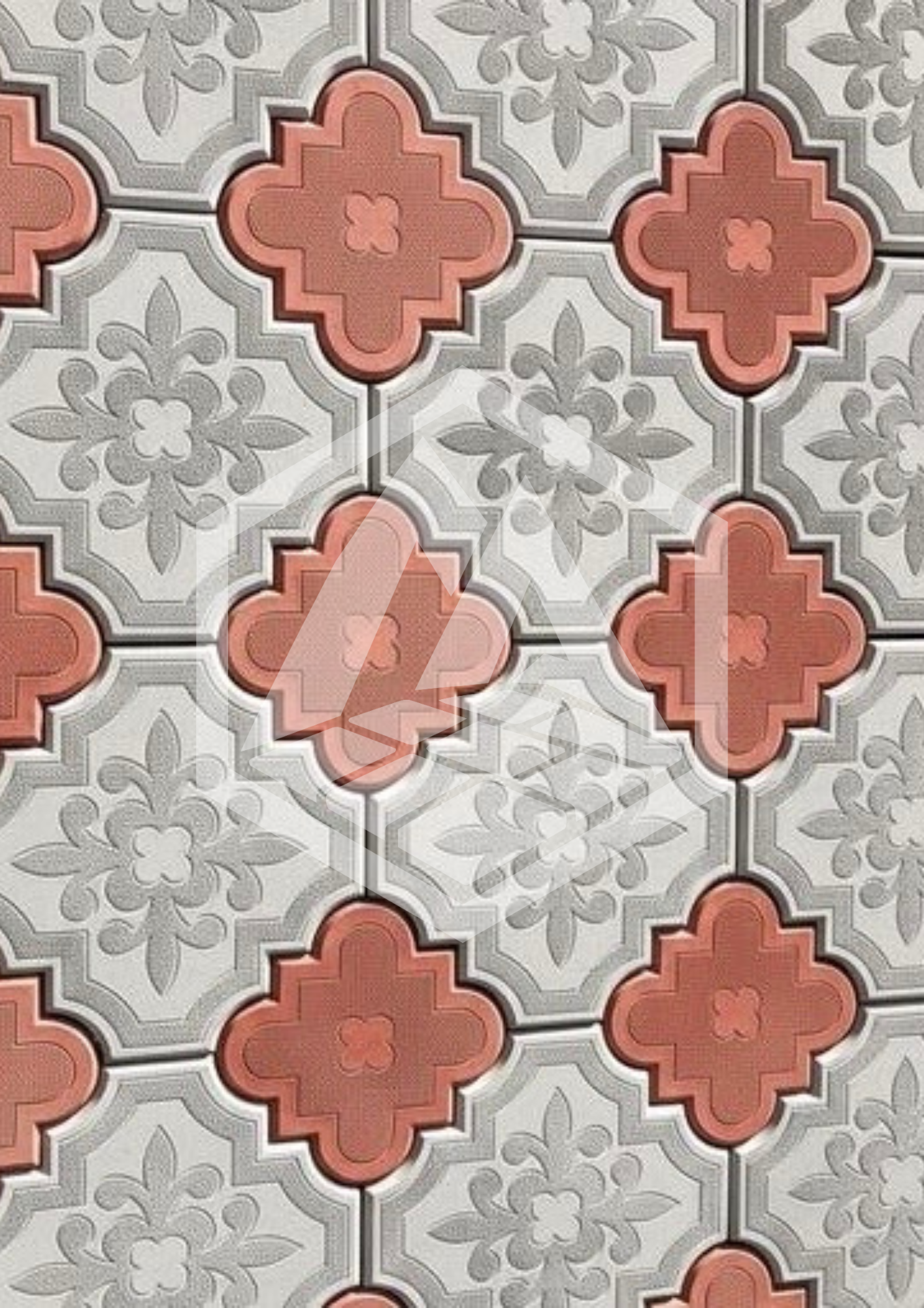 Pattern of vintage ceramic tiles in red, white, and gray with floral and geometric designs.