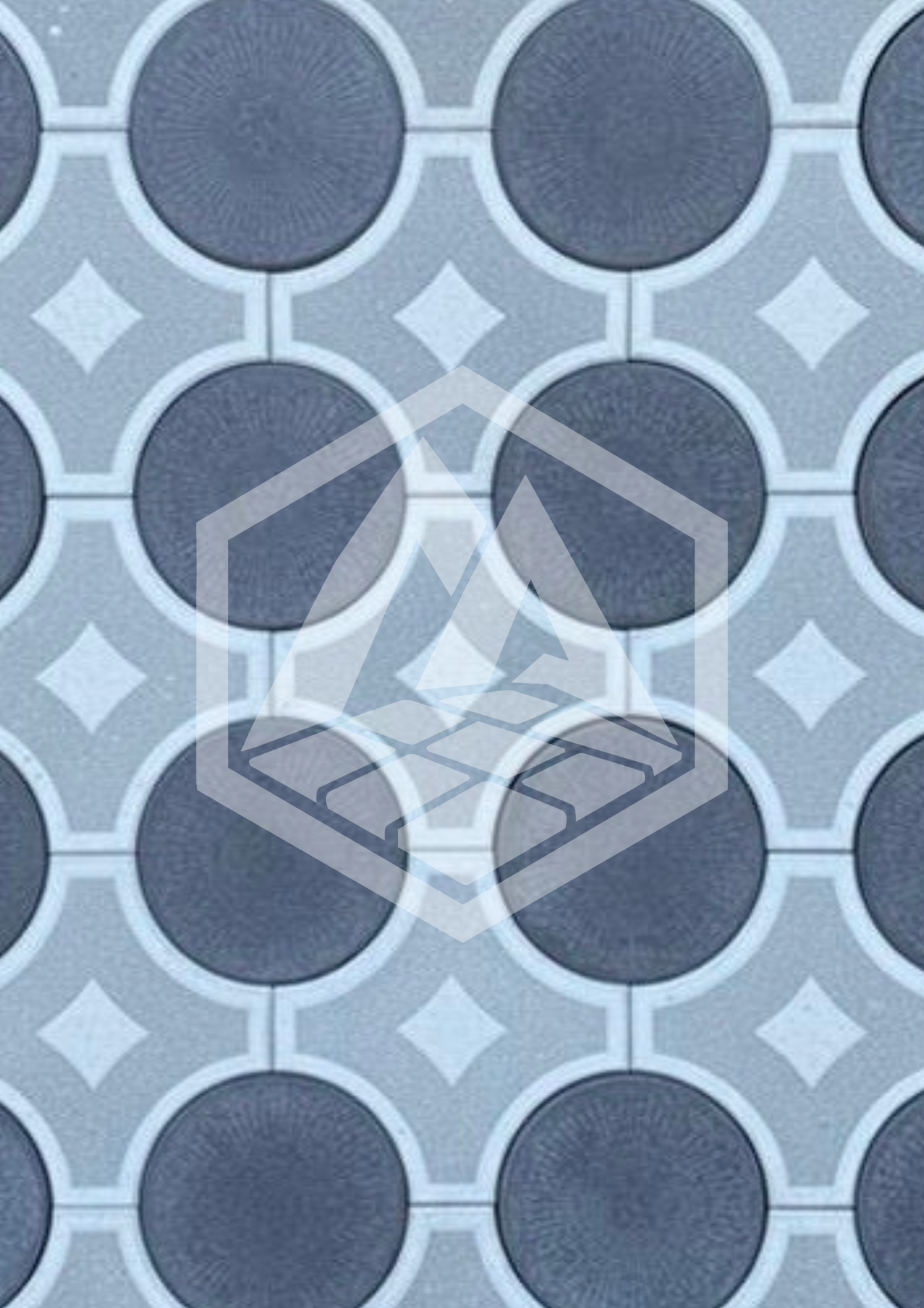 Close-up of geometric patterned floor tiles with circular and diamond shapes in shades of gray and navy blue.