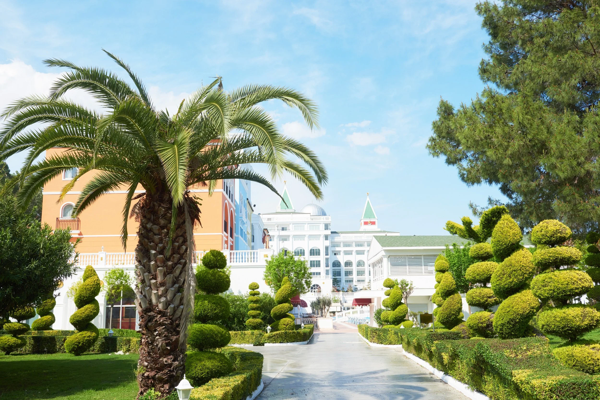 walkway-summer-park-with-palm-trees-amara-dolce-vita-luxury-hotel-resort-tekirova-kemer-turkey.jpg