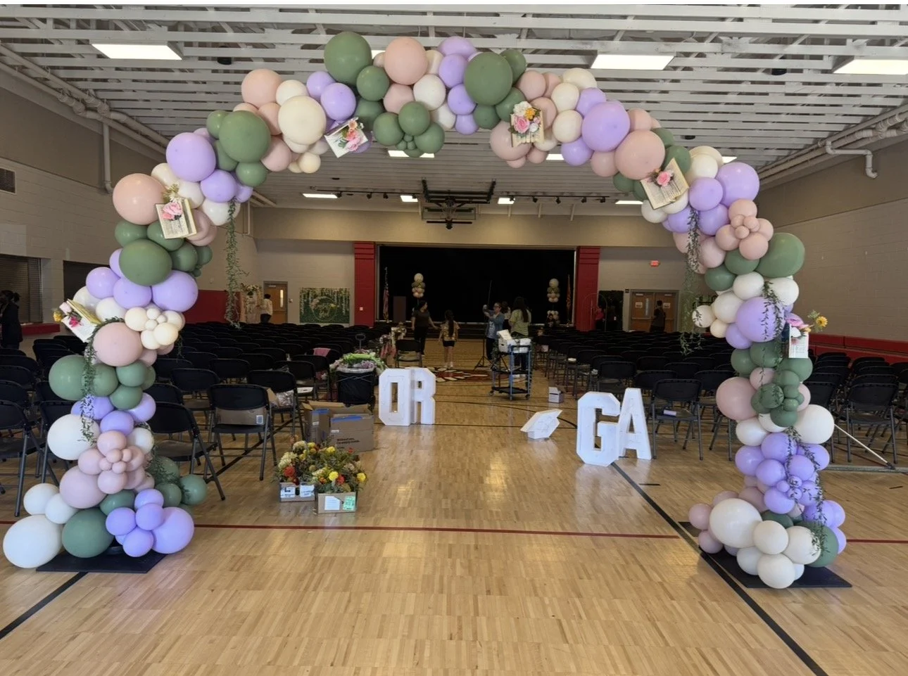 Into the Next Chapter Graduation themed Organic Balloon Arch