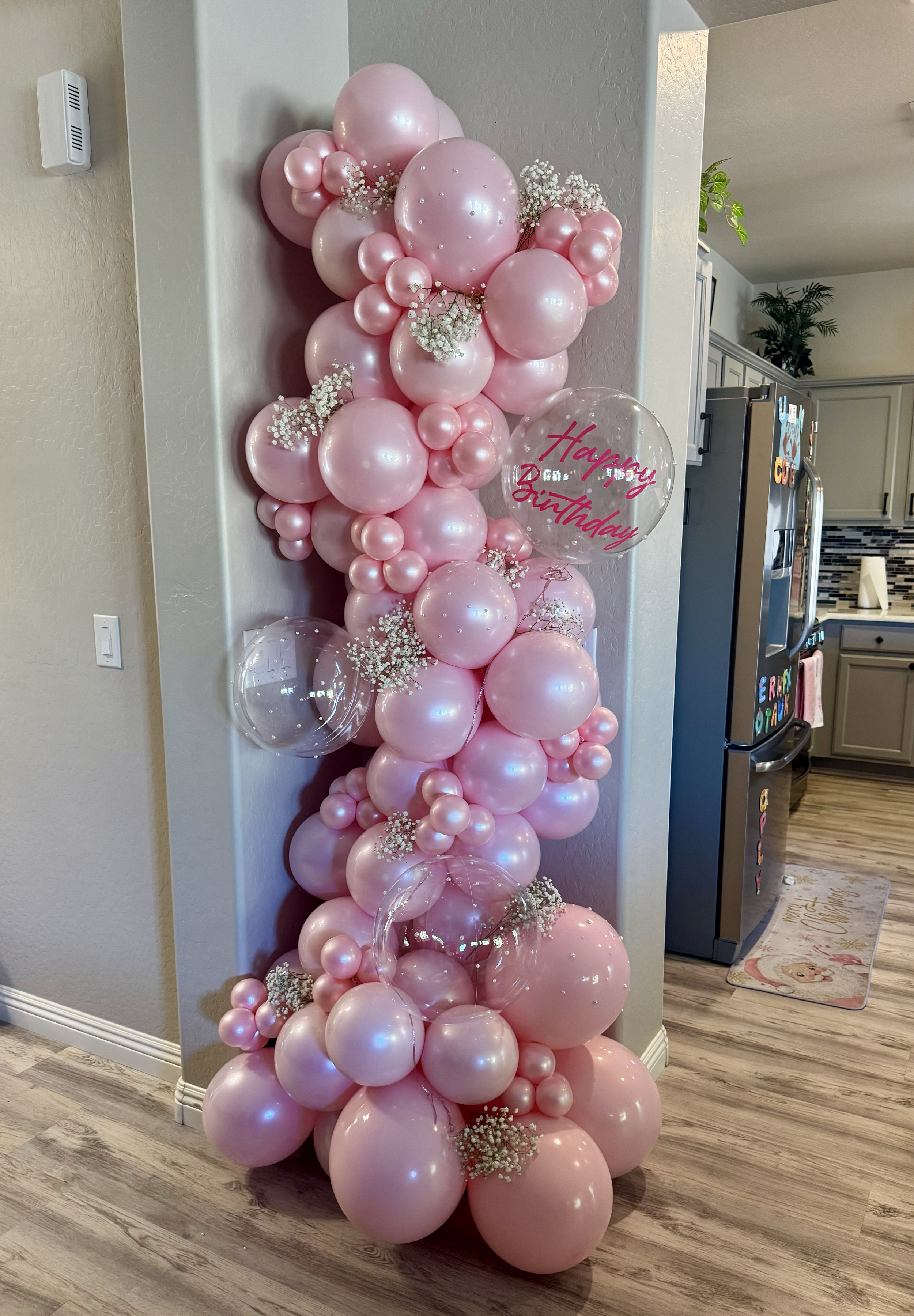 Pearl Pink balloon garland with babies breath and pearl accents