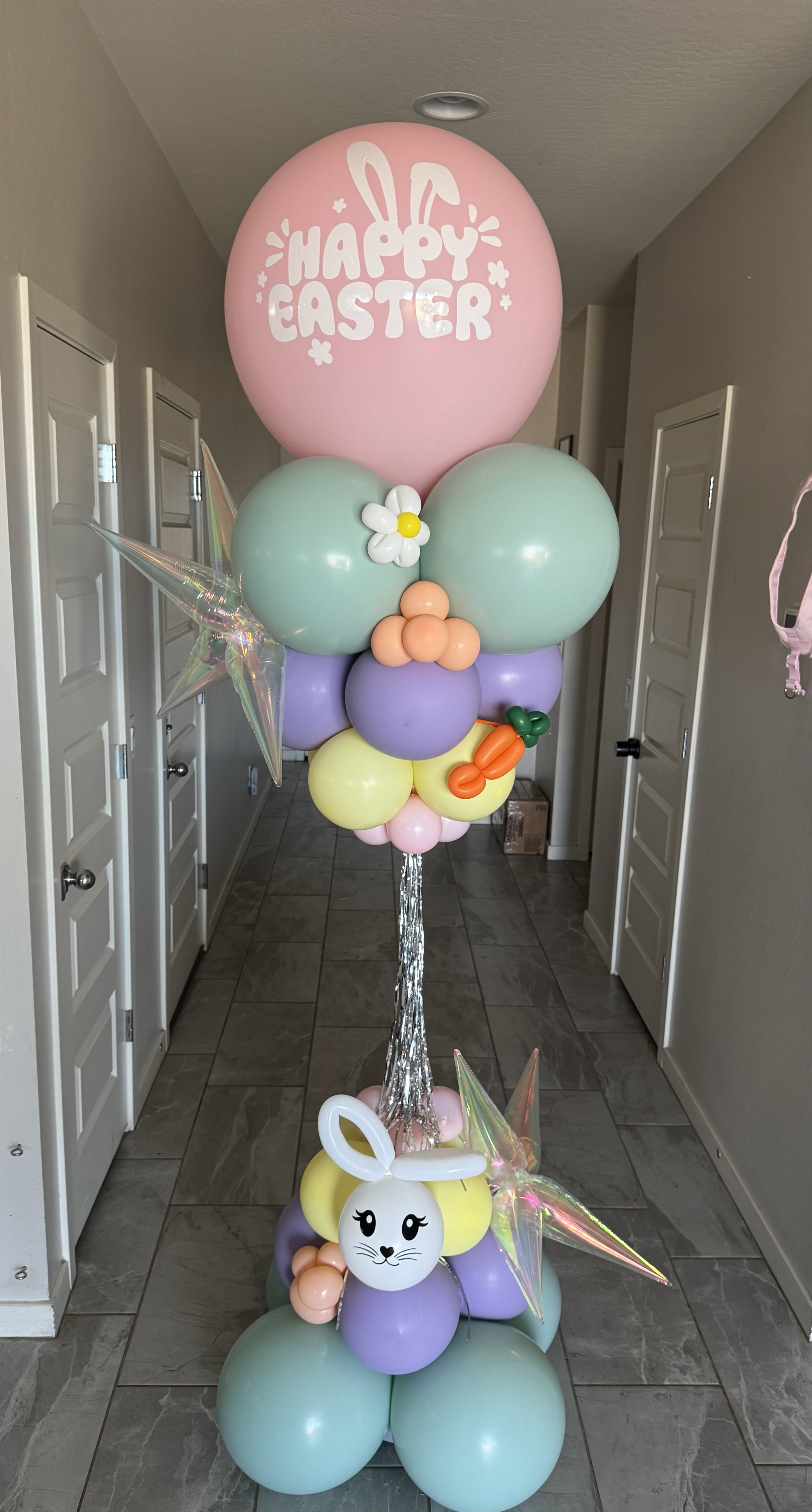 Easter themed Balloon Tower featuring pastel balloon colors, balloon bunny & carrot details