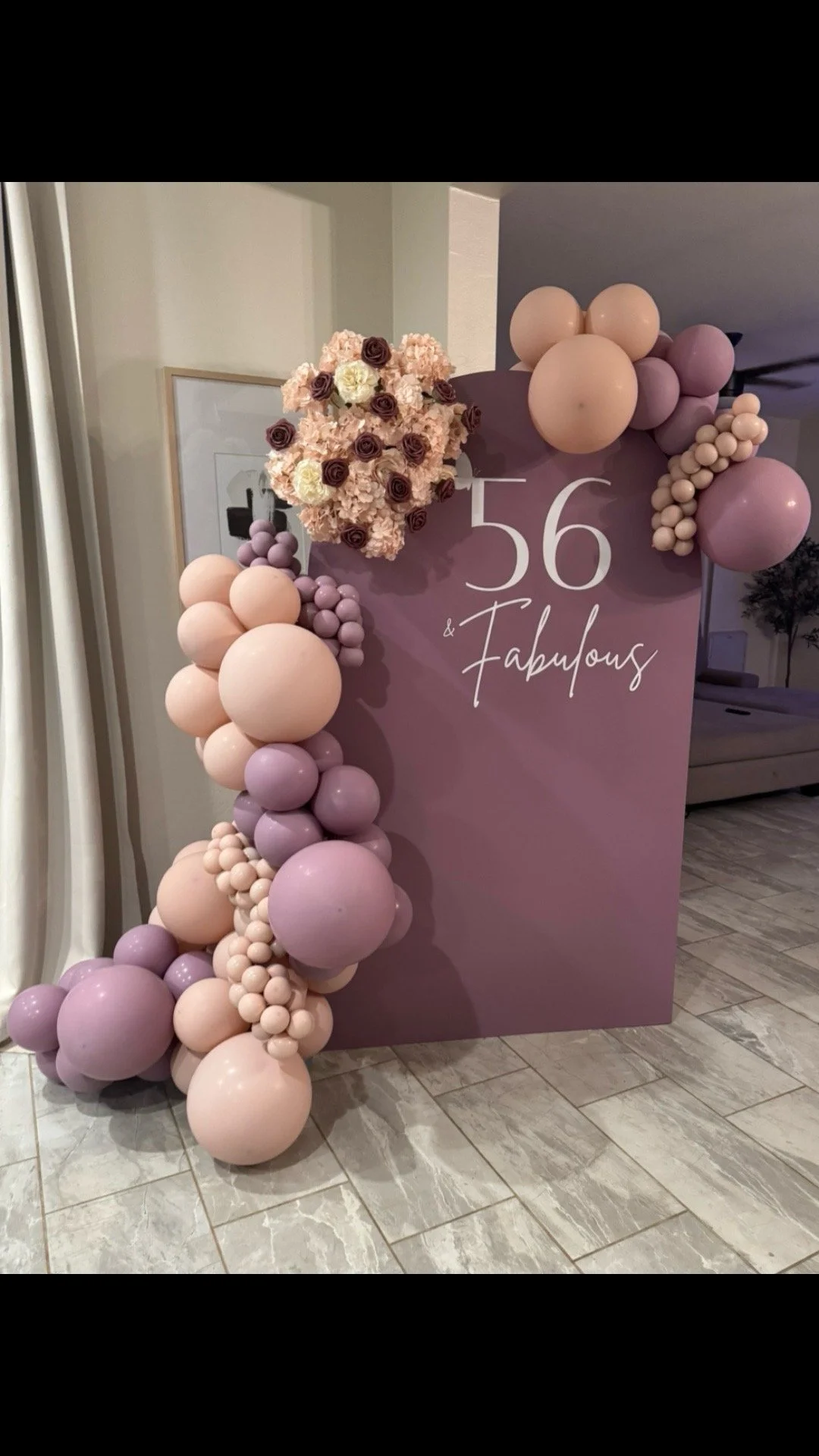 She's '56 & Fabulous' Dusty Pink and Purple Balloons and matching floral arrangement for a lovely surprise birthday celebration