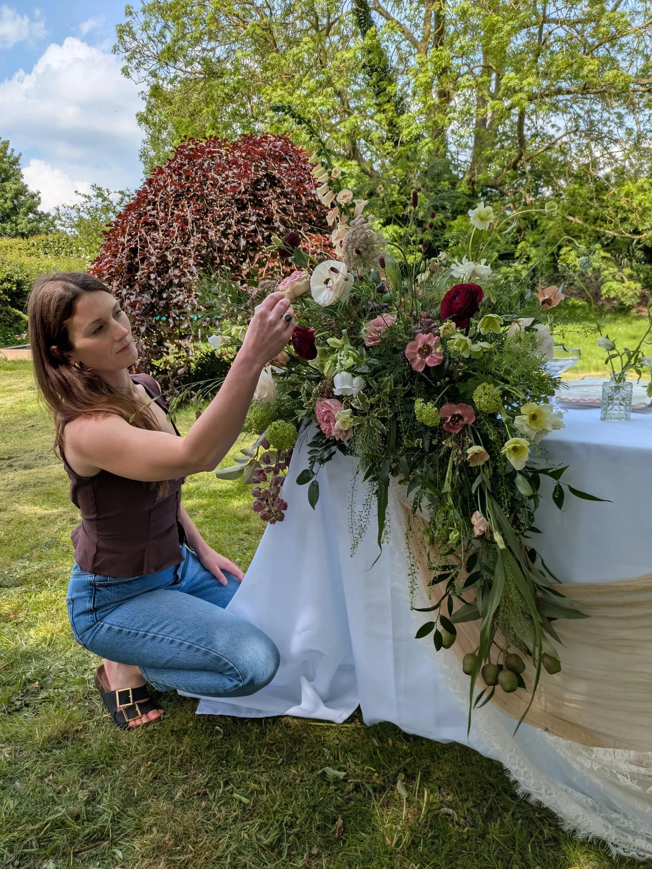 Amy from Chosen View is Arranging A Floral Table Arrangement in Nottingha,