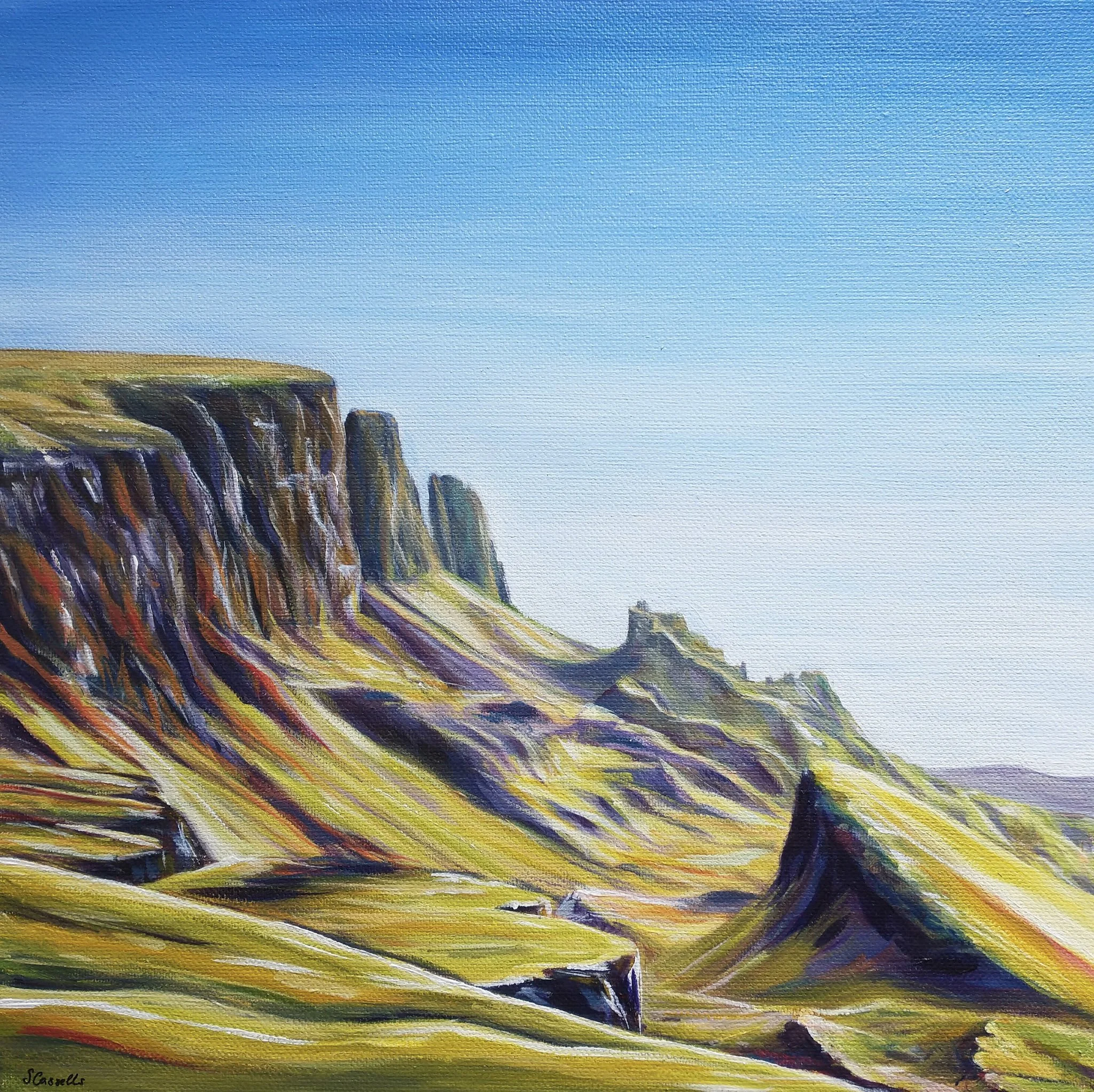 Colorful landscape painting of cliffs with layered, multicolored striations, under a gradient blue sky.