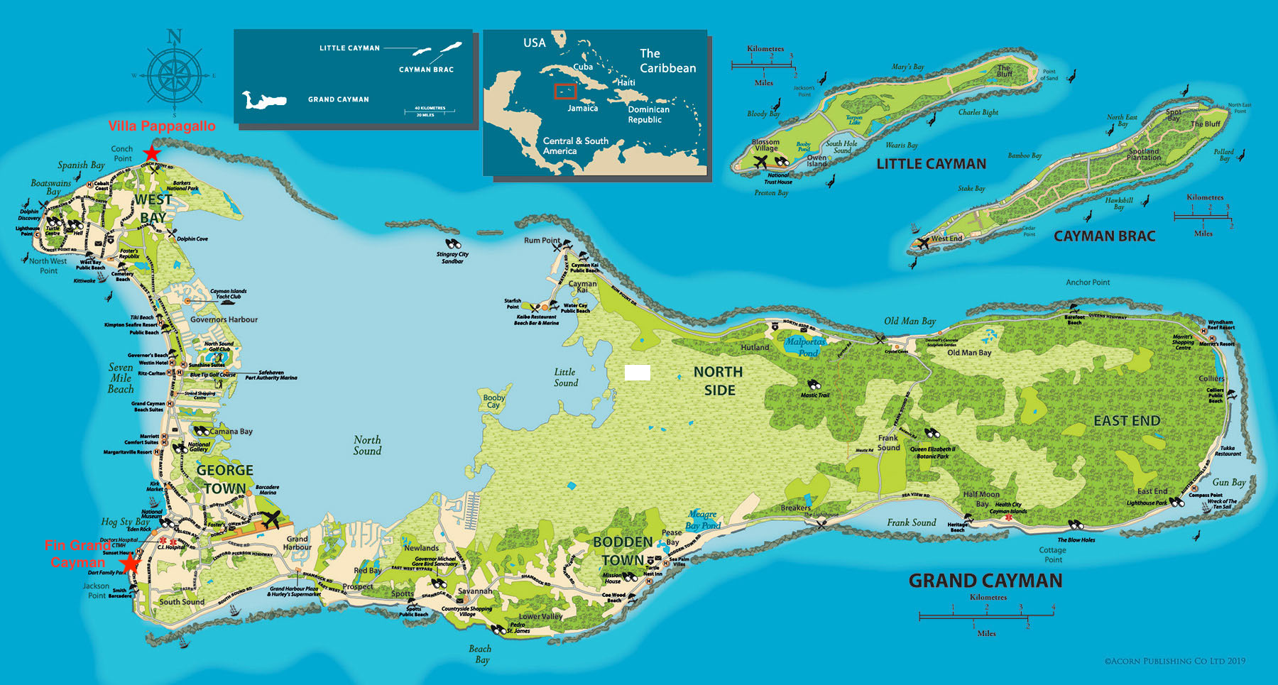 Map of Grand Cayman island showing different districts, beaches, landmarks, and points of interest, including Villa Pappagallo, Fin Grand Cayman, and notable bays and parks.