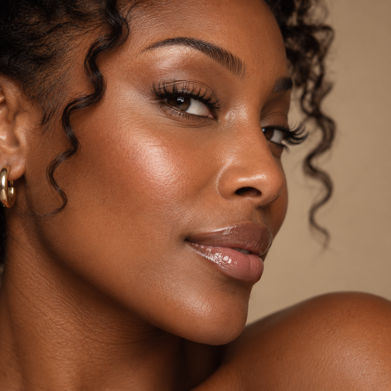Close-up beauty portrait highlighting the profile and nose, representing non-surgical nose slimming and lifting aesthetic treatments at LuxéPrive Aesthetics.