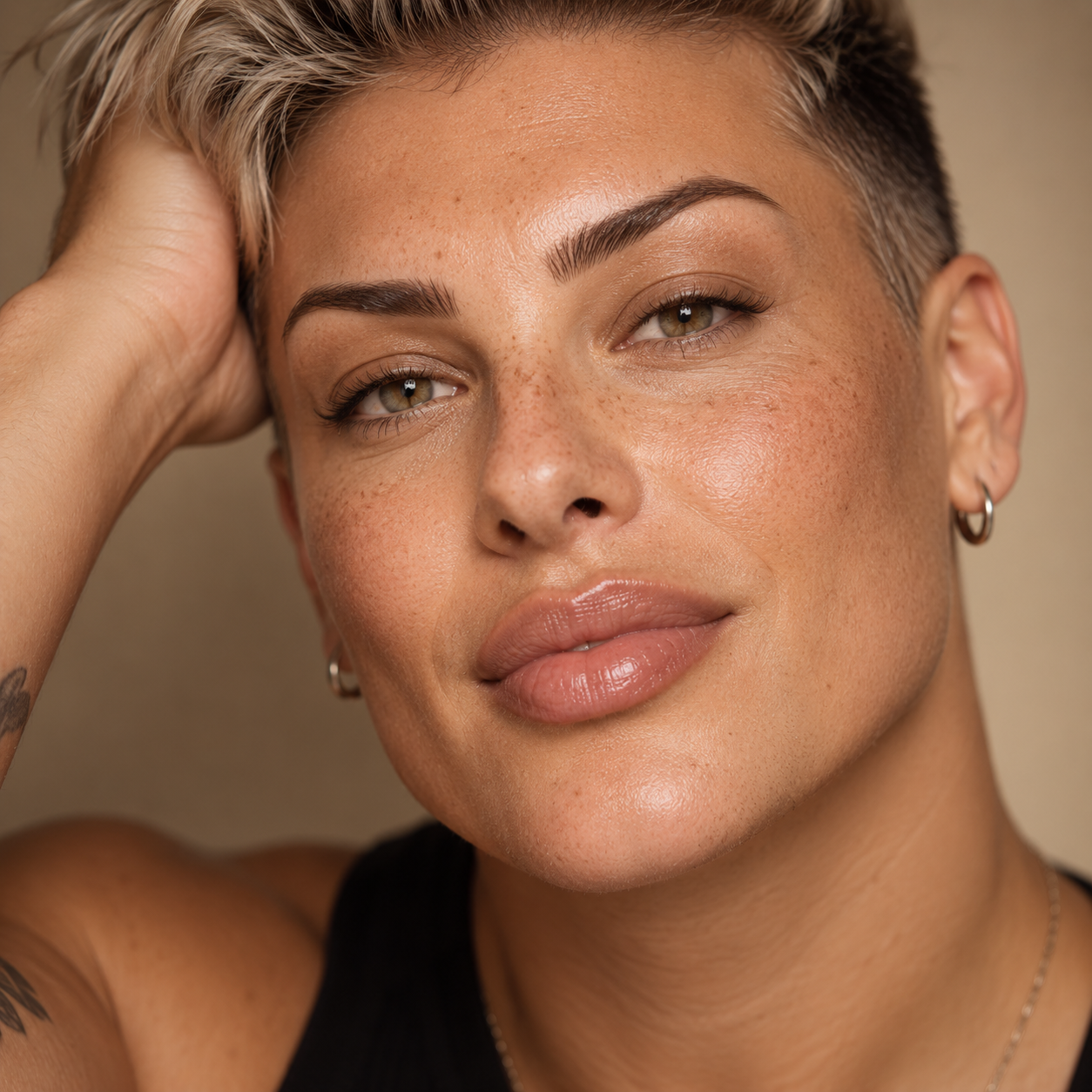 Close-up portrait of a diverse client with smooth, radiant skin, representing full face aesthetic treatments and personalised facial rejuvenation at LuxéPrive Aesthetics.