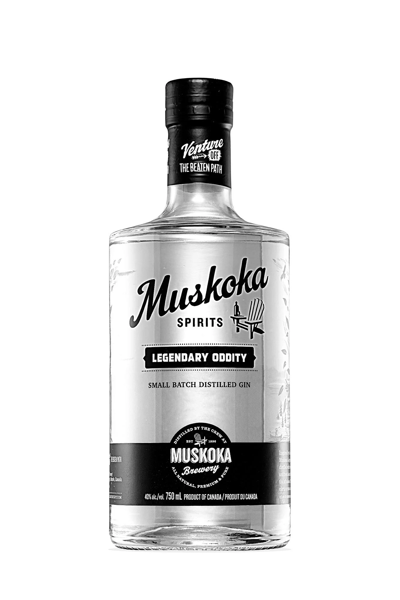 A clear glass bottle of Muskoka Spirits gin with a black cap and label, featuring the brand name and details about the small batch distillation process.