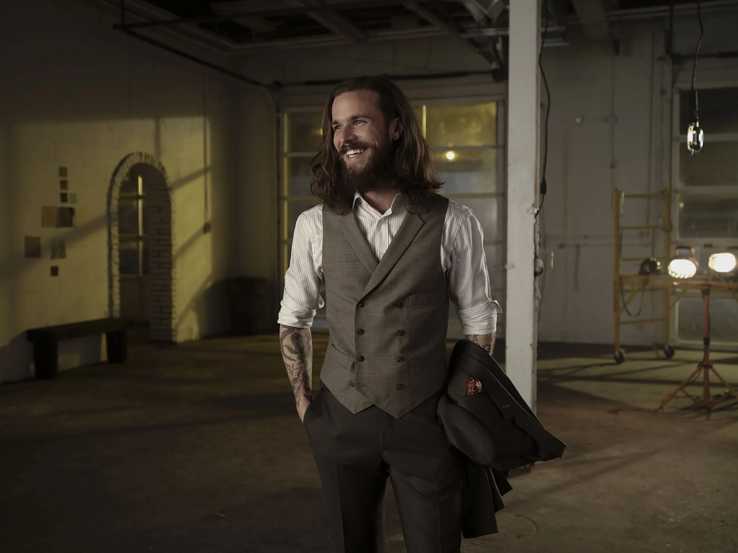 Commercial fashion photography featuring custom menswear for the Indochino brand campaign, photographed on location with natural cinematic lighting.