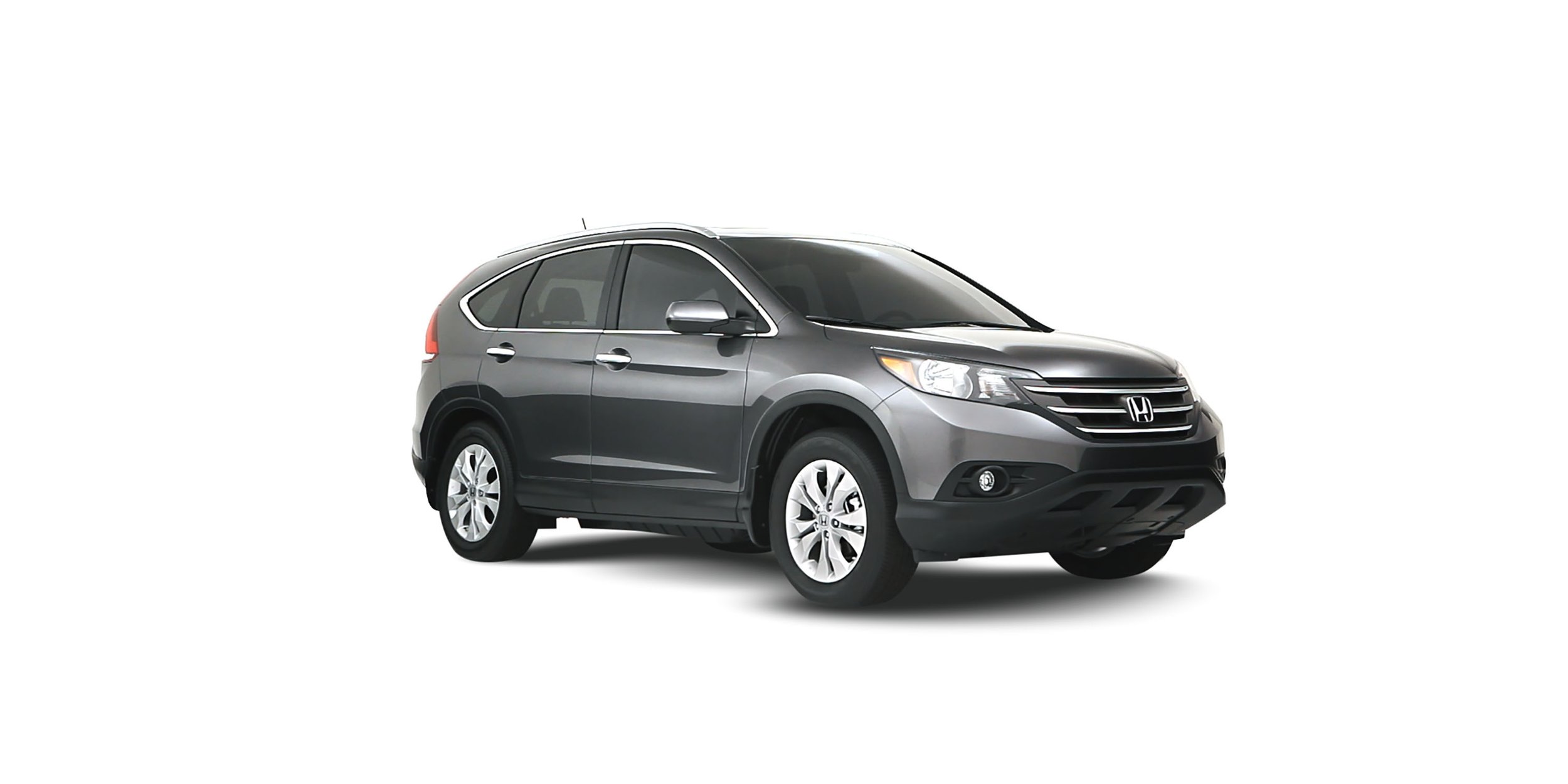 A silver Honda SUV parked on a white background.
